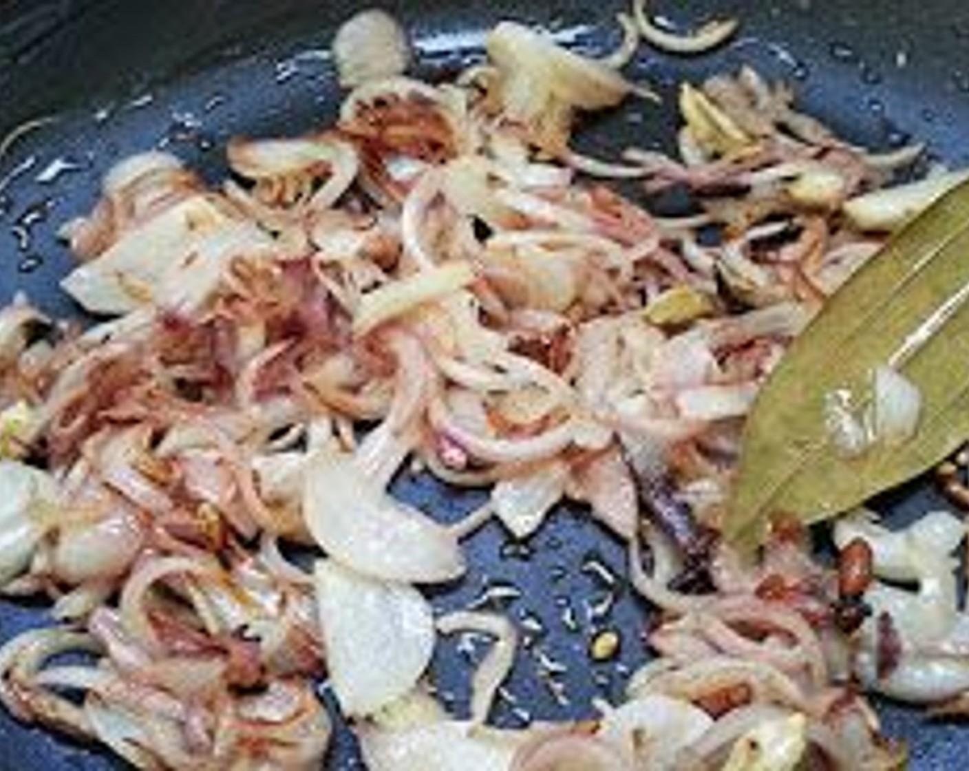 step 5 Add Onions (2) on and sautee on medium flame till onion starts to become light brown in color.