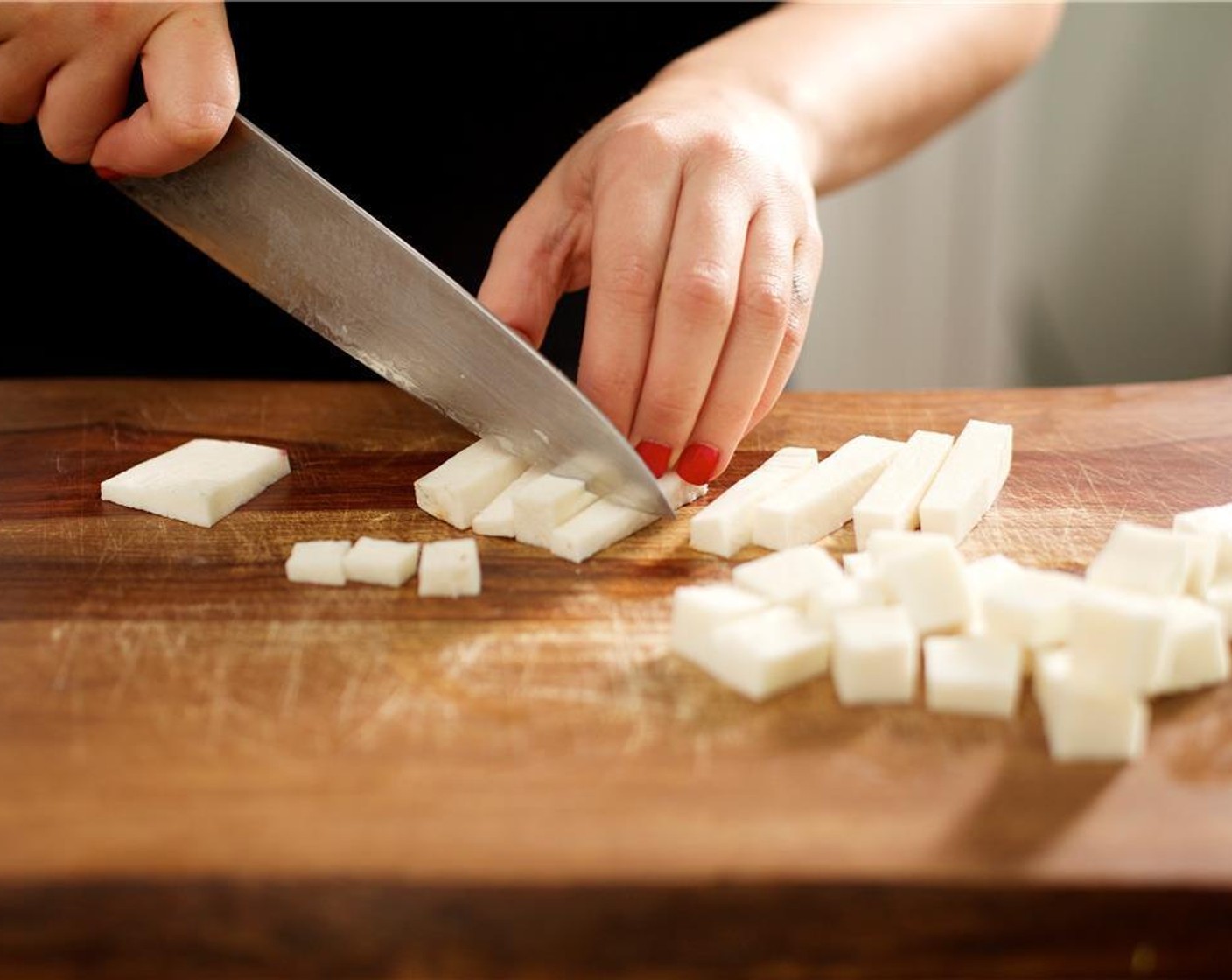 step 1 Peel and cut peeled Cassava (1 cup) in half lengthwise and then cut into half inch cubes. Set aside.