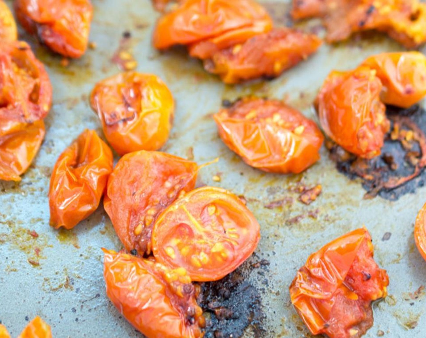 step 7 Place in the oven and cook for 15-20 minutes until caramelized. You will need to scrape the tomatoes off the pan with a spatula.