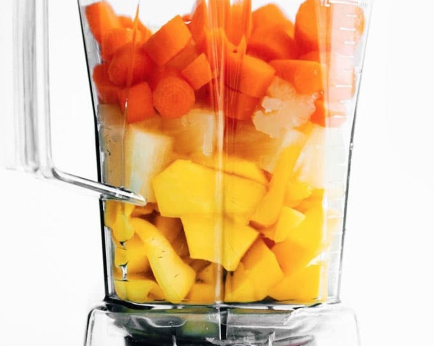 step 1 Place Carrot (1 cup), Mango (1), Pineapple (1 cup), Fresh Ginger (1 tsp), and Water (1/4 cup) in a blender and blitz until smooth.