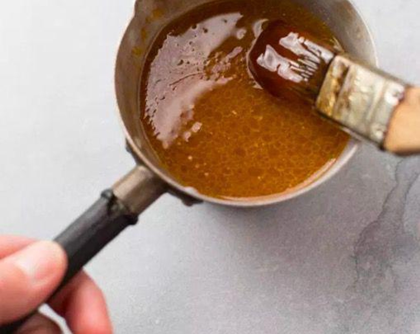 step 1 To make the marinade, combine the Barbecue Sauce (4 Tbsp), Apple Cider Vinegar (1/2 cup), Cayenne Hot Sauce (1 tsp), and Butter (2 Tbsp) in a small pot.