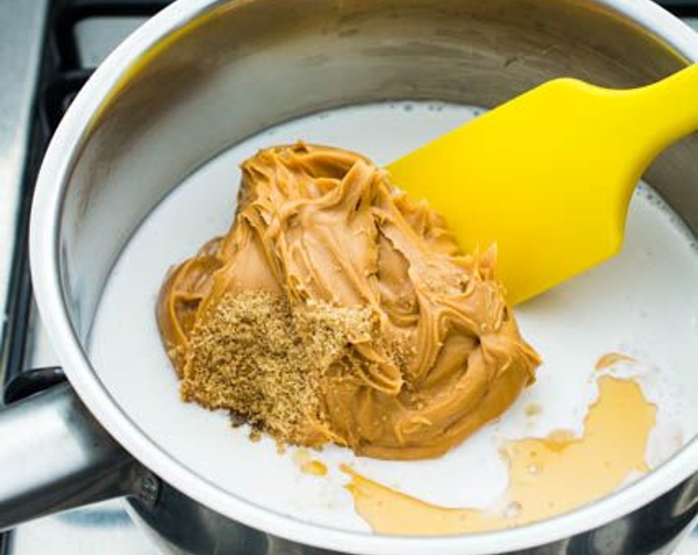 step 2 Put Coconut Milk (1 cup), Creamy Peanut Butter (1 cup), Soy Sauce (1 Tbsp), Fish Sauce (1 Tbsp), Rice Vinegar (1 Tbsp), Sesame Oil (1/2 tsp), and Brown Sugar (2 Tbsp) for the peanut sauce in a small saucepan.