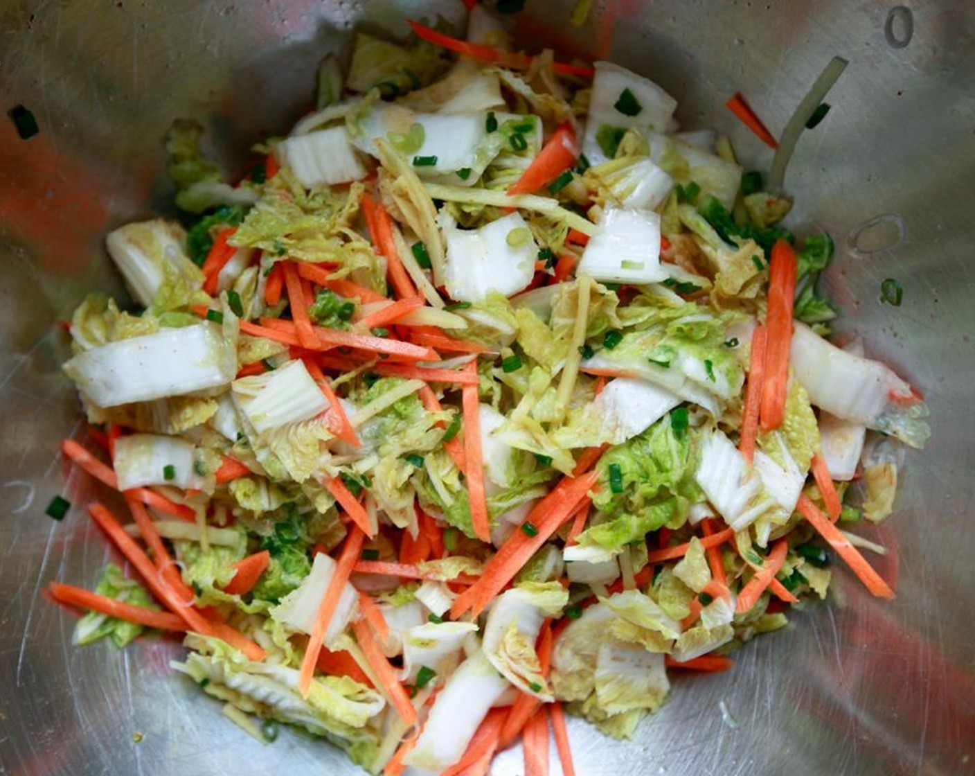 step 6 After the cabbage has soaked in the brine, pour the brine into a jar and reserve for later. Add the carrots and ginger add the spring onions and Cayenne Pepper (1/2 tsp) and mix well.