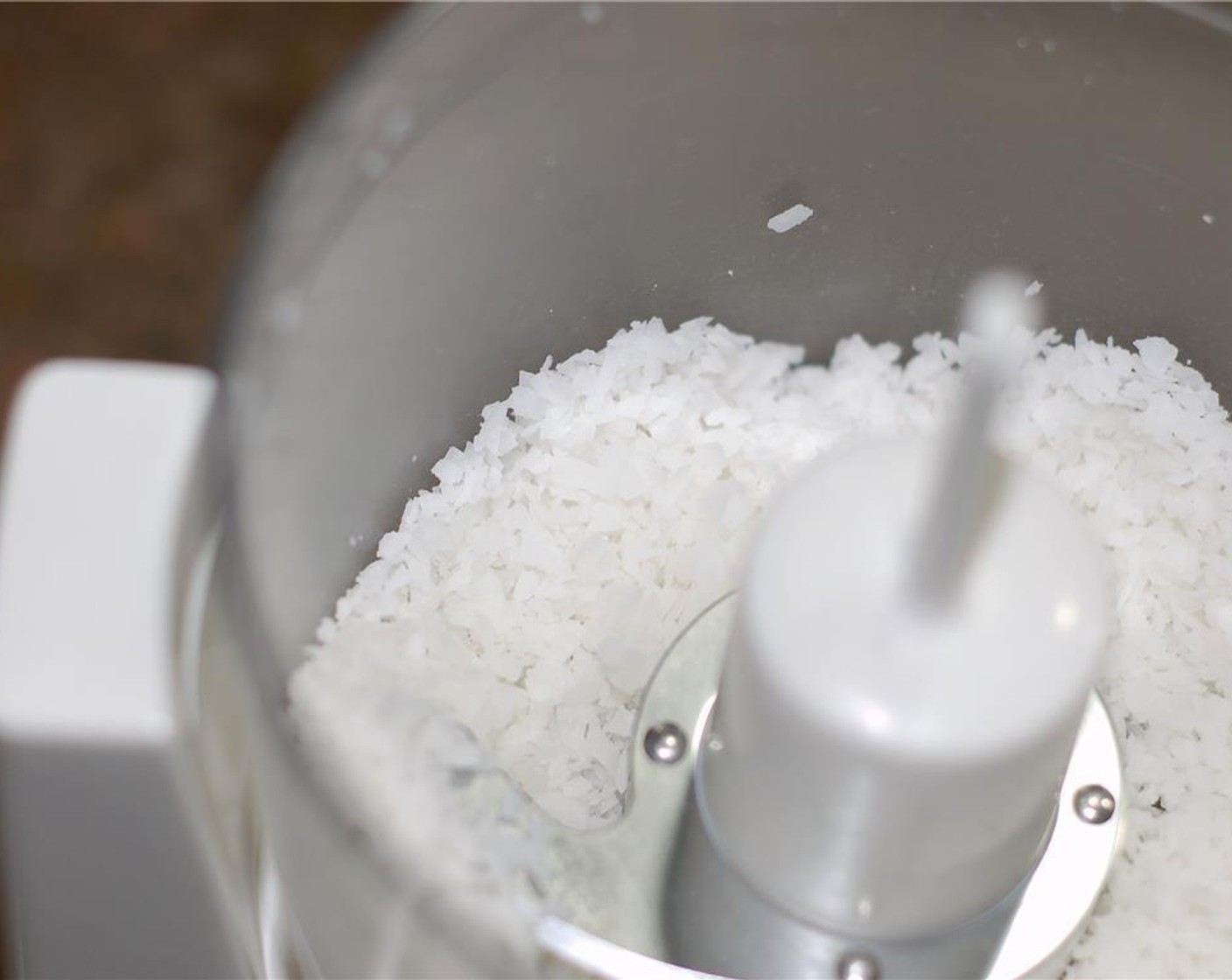 step 2 I wanted a smooth fudge, so I put the shredded coconut flakes in the food processor and pulsed it a few times to get the flakes even finer. Your choice.