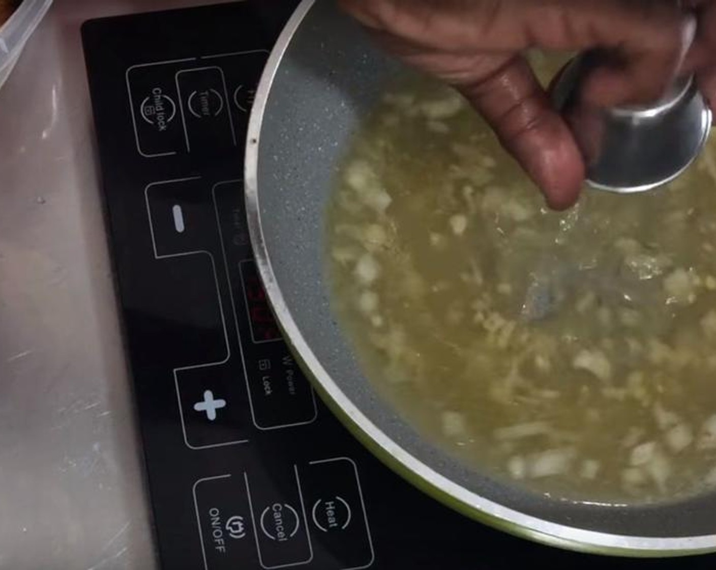 step 4 Heat up a frying pan with some oil in it. Add Onion (1). Cook for 30 seconds and add Garlic (1/2 Tbsp), Fresh Ginger (1/2 Tbsp). Cook for thirty more second. Add the rest of the broth and water mixture, Rice Vinegar (1/4 cup), Red Chili Pepper (1/2 tsp), Gluten-Free Soy Sauce (1/2 cup) and Granulated Sugar (3/4 cup). Mix them together and bring it to boil.