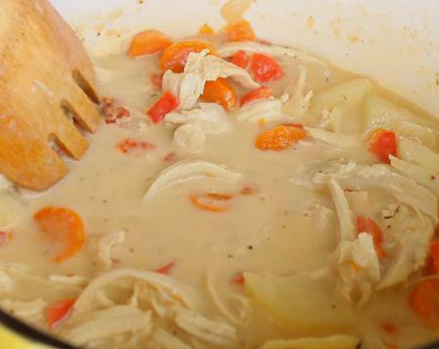 step 5 Shred the chicken on the side. Then add it back to the sauce pan together with the Heavy Cream (4 Tbsp). Cook this for about 3 minutes.