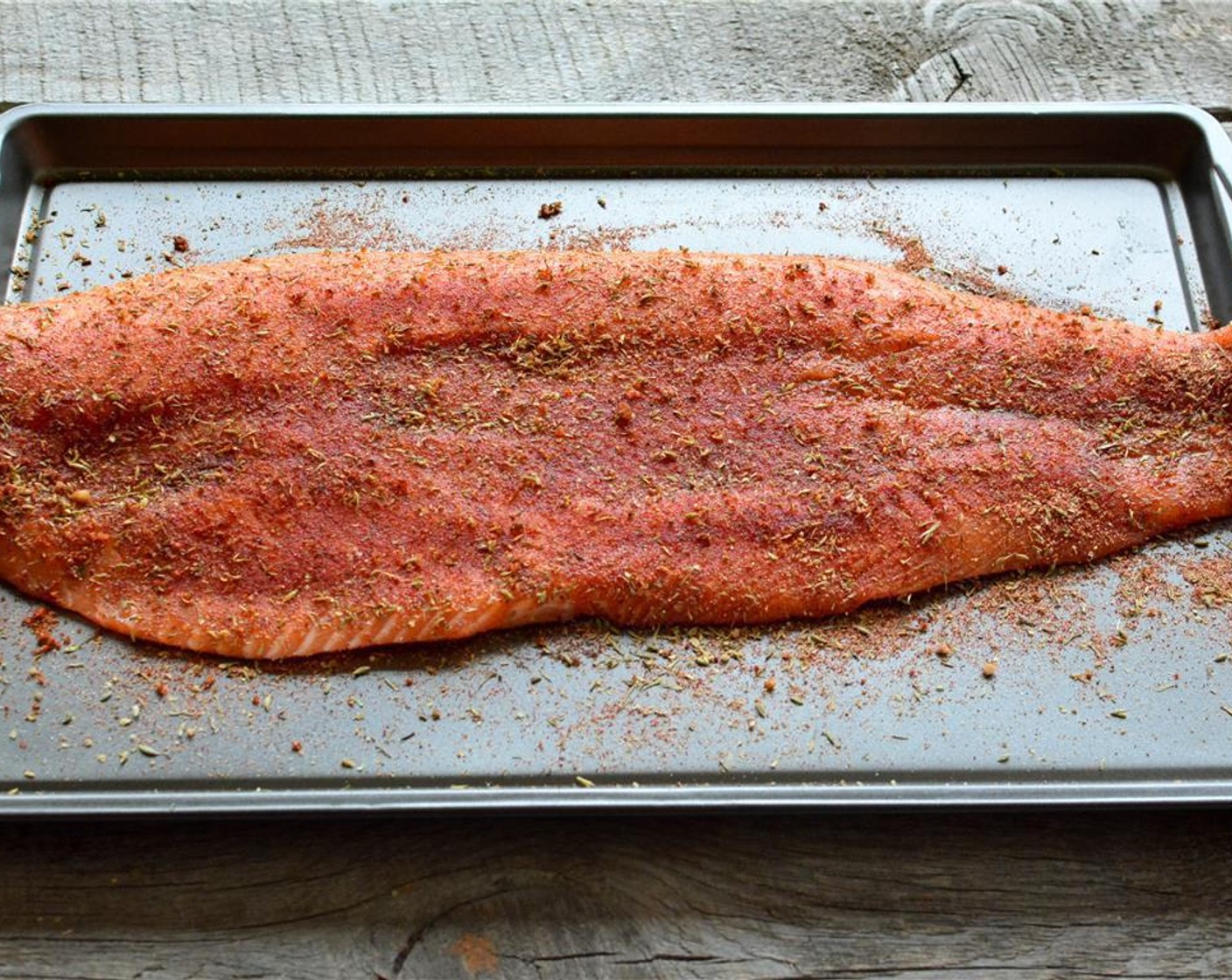 step 4 Generously sprinkle the blackened seasoning all over the salmon to coat it evenly. Repeat on the other side.
