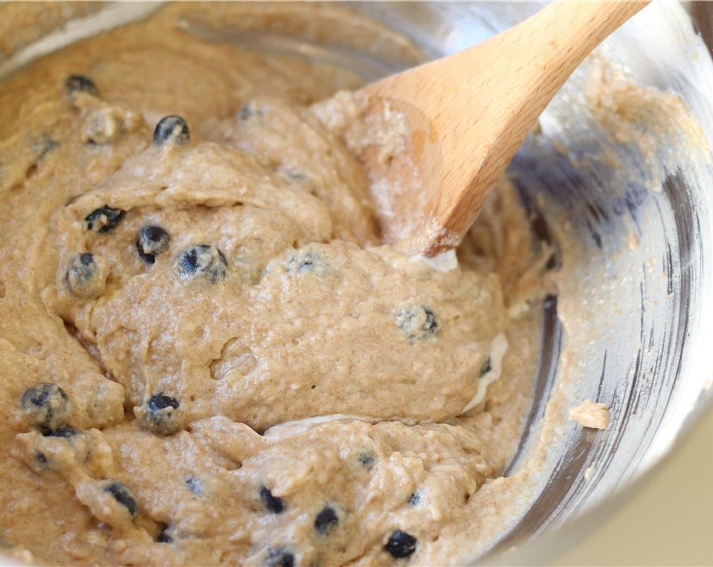 step 8 Gently stir in the blueberries (1/2 cup). Be careful not to overmix the batter!