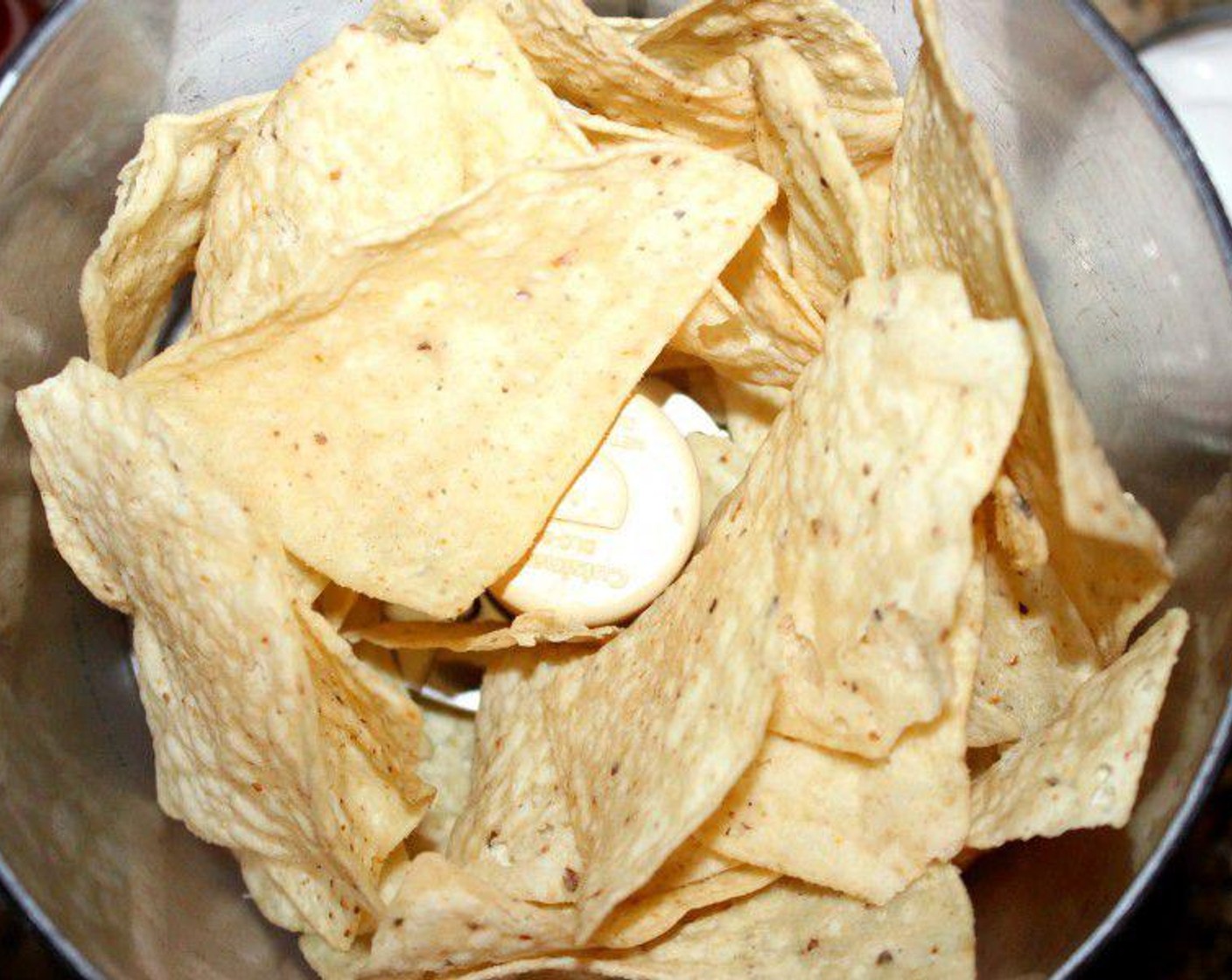 step 3 In a food processor (or with a zip bag and aggression) crush up the Tortilla Chips (17 1/2 cups) into coarse crumbs.