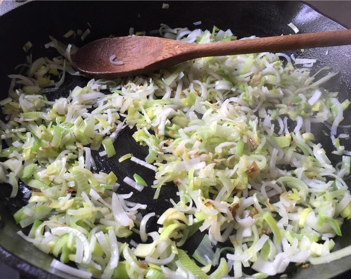 step 9 Heat a large pan over medium-high heat. When hot, add Olive Oil (1 Tbsp) and the leeks. sauté for 3 to 4 minutes until they have a little color and begin to soften.