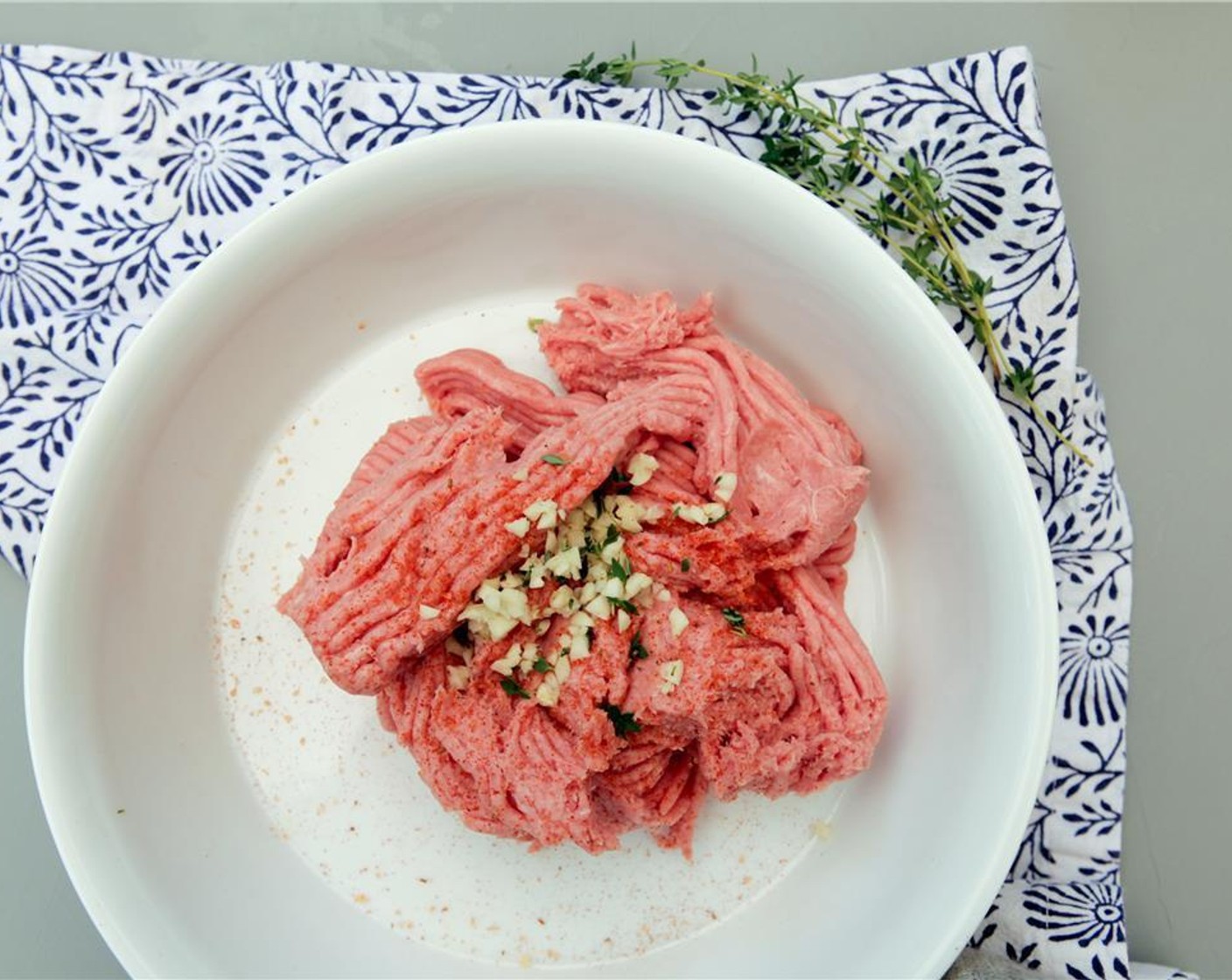 step 6 In a medium bowl, combine the Ground Turkey (1 lb), minced garlic, chopped thyme and Sea Salt (1 tsp). Mix together gently, but thoroughly. Your hands are best for this, but a mixing spoon or stiff spatula will also work.