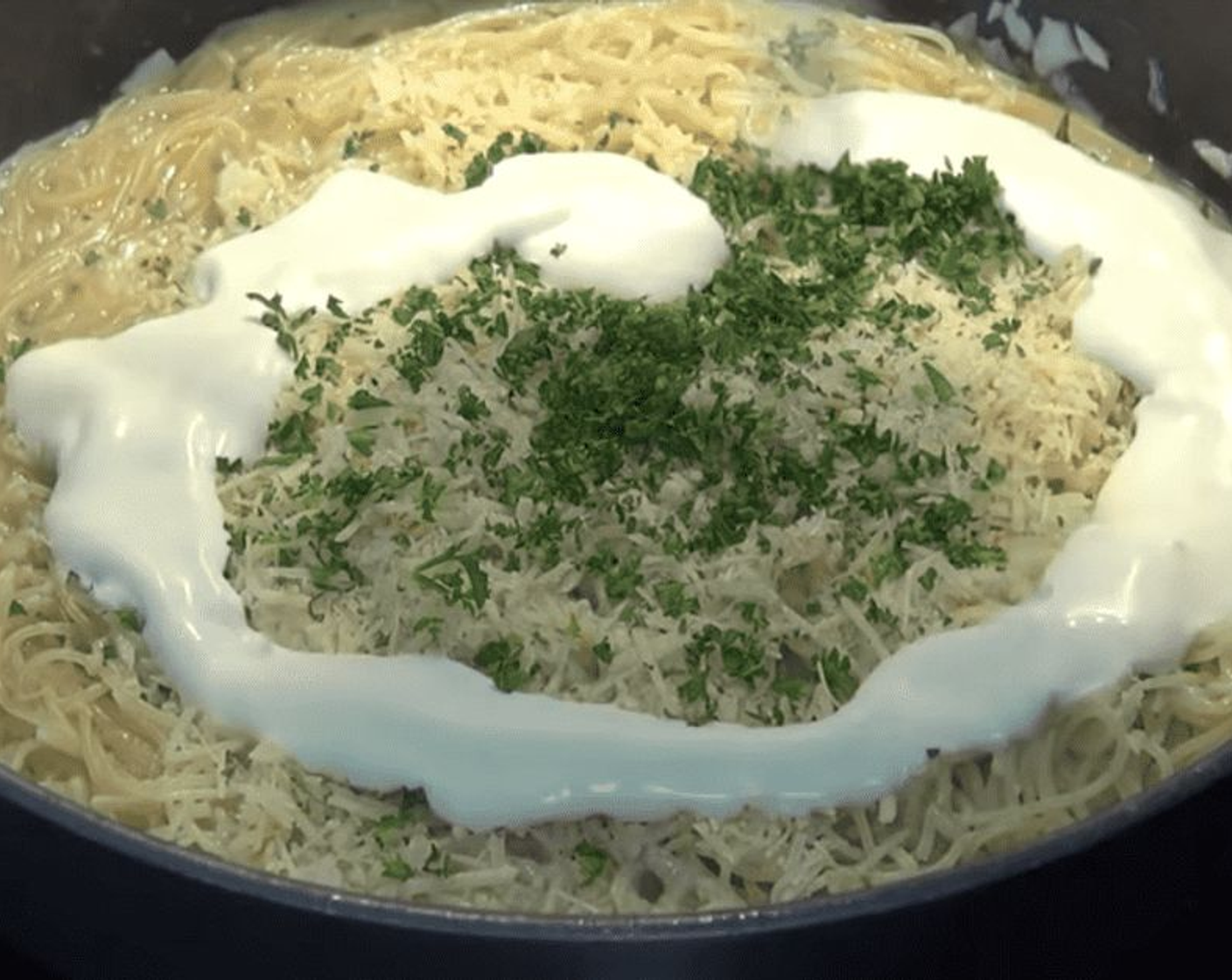 step 6 Add the Fresh Parsley (1 Tbsp), Grated Parmesan Cheese (1 cup) and Cream (3/4 cup) and stir through until the cheese has completely melted.