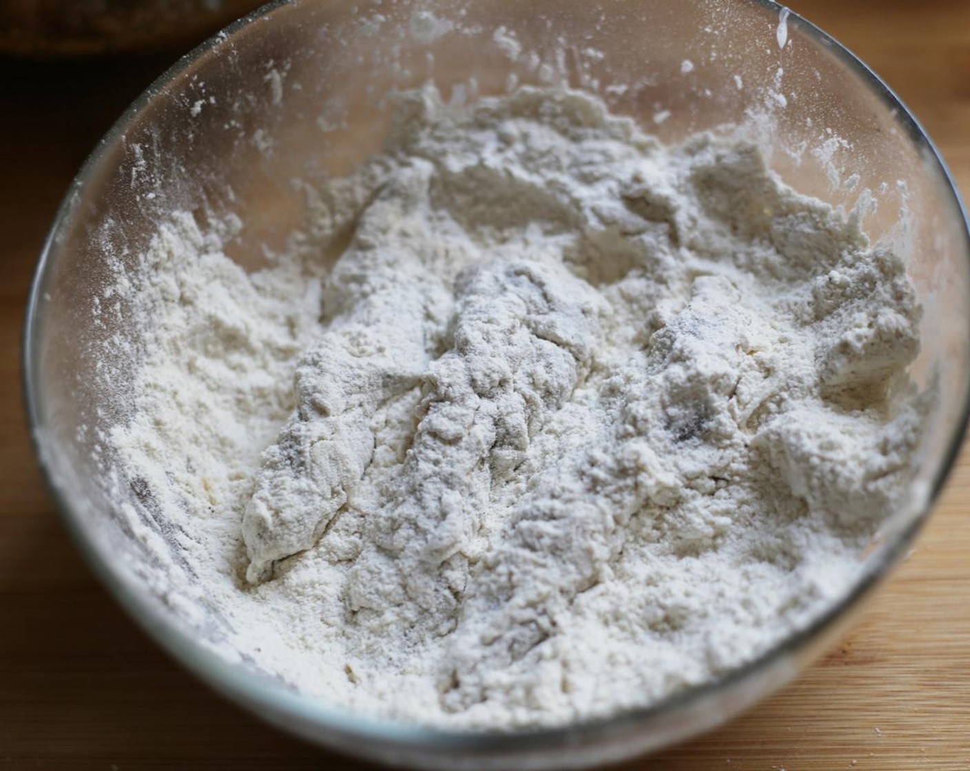 step 8 Dredge for a second time in the flour mixture, shaking off any excess.