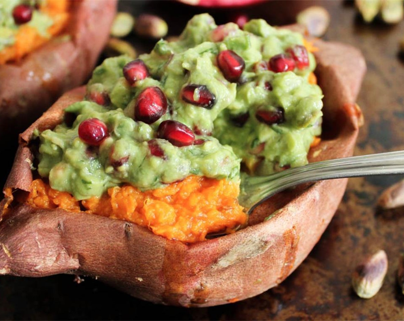 step 10 Top each sweet potato with plenty of pomegranate-pistachios guacamole, and shamelessly dig into your superfood sensation.
