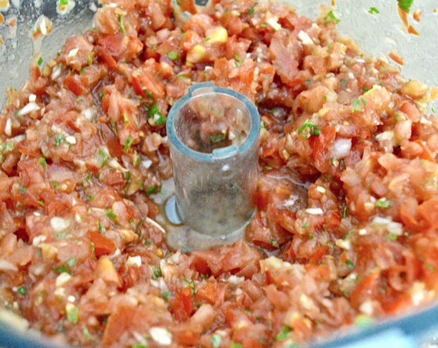 step 1 Combine Plum Tomatoes (5), Onion (1), Fresh Basil (1/3 cup), Garlic (4 cloves), Balsamic Vinegar (1 Tbsp), Olive Oil (1 Tbsp), and Salt (1 pinch) in a food processor and pulse them together a bunch of times. It should still have a lot of texture and not be pureed. Set the mixture aside.