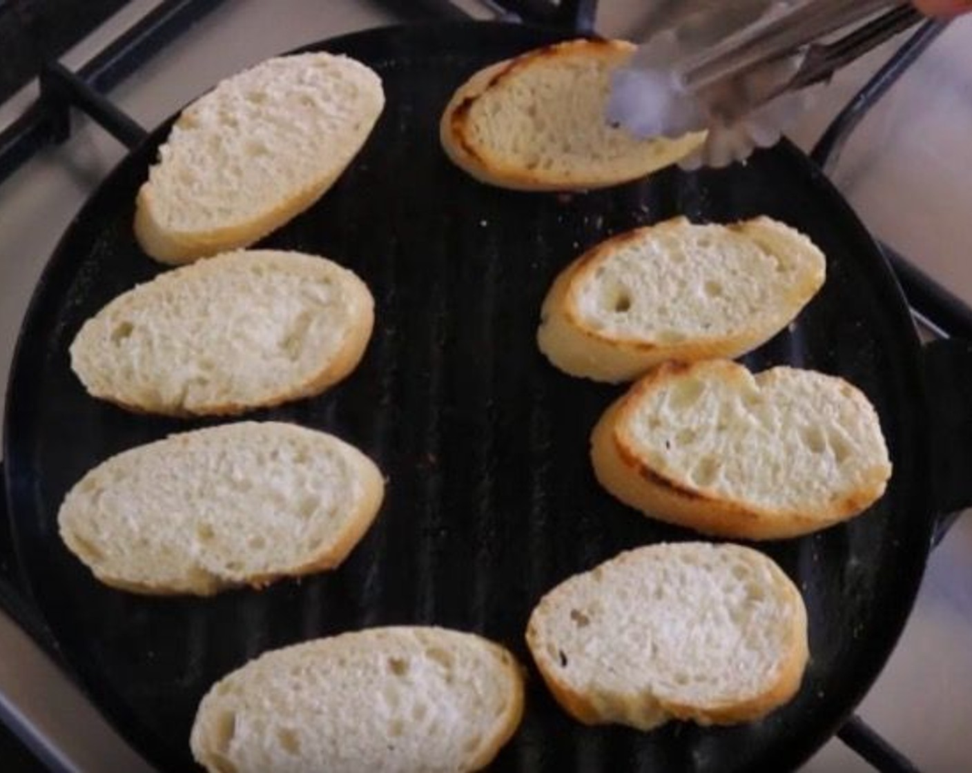 step 7 Heat a grilling pan over a medium heat. Once the pan gets hot, add the slices of bread and toast for 2 minutes on each side.