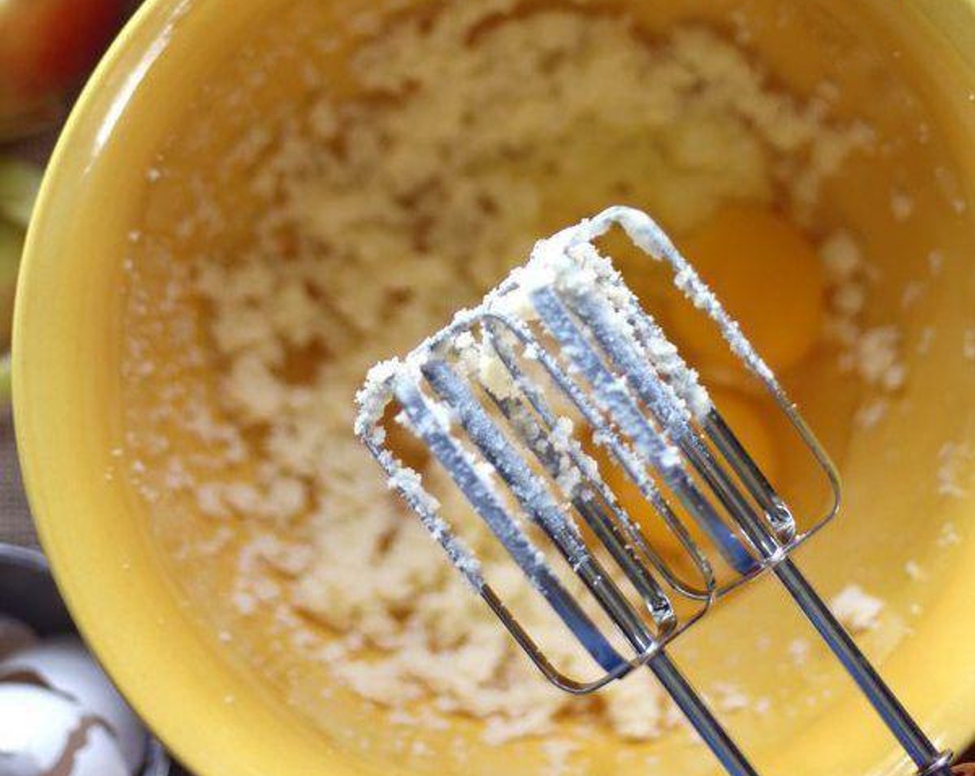 step 4 In a bowl, stir together the All-Purpose Flour (1 cup), Baking Powder (1 tsp), Salt (1/4 tsp), and Simply Organic Cinnamon, Ground (1/4 tsp). In a separate larger bowl, beat the Granulated Sugar (1/2 cup) and Butter (4 Tbsp) together until light and fluffy. Whip in the Eggland's Best Classic Eggs (2) and Vanilla Extract (1 tsp).