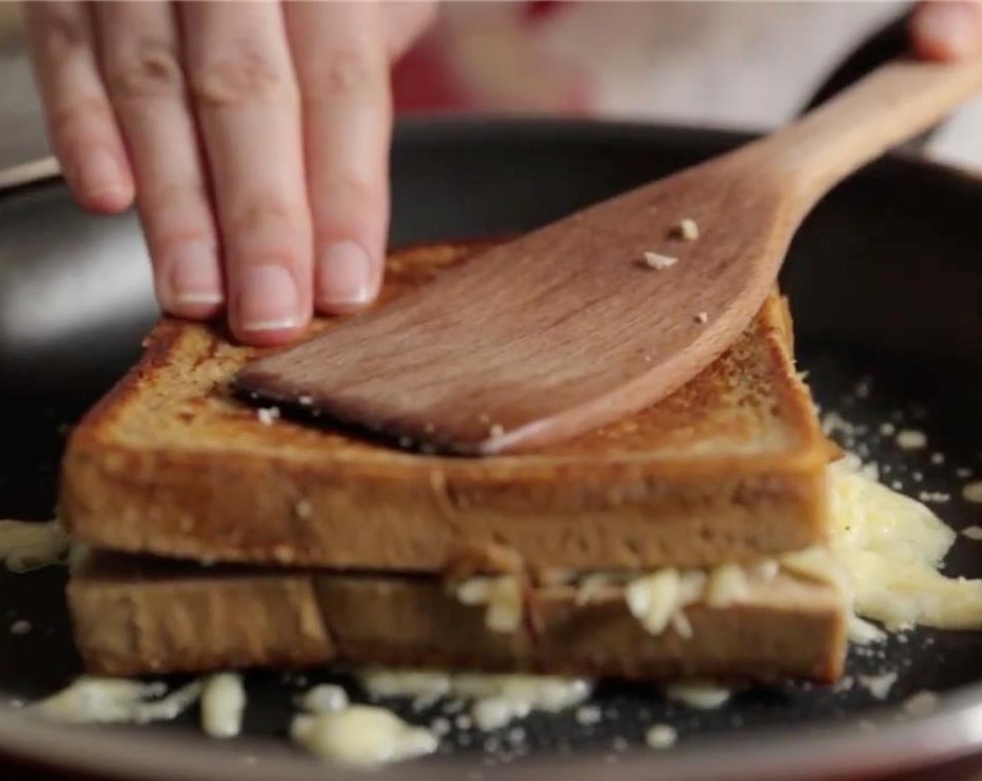 step 9 Allow the emmental to melt and then return the sandwich to the pan directly over the emmental