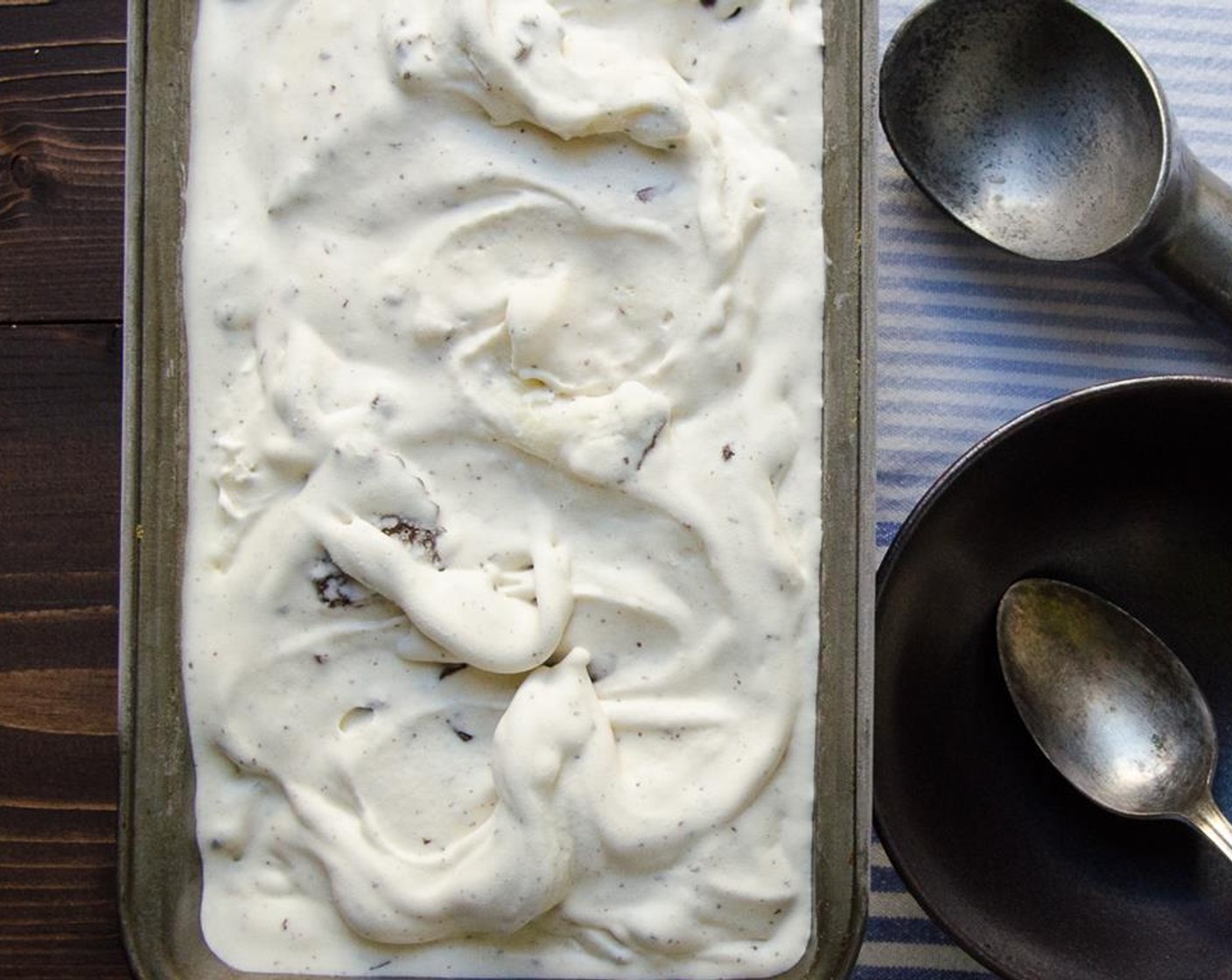 step 8 When finished, transfer the ice cream to a freezer container and chill until firm, about 2 hours. Serve.