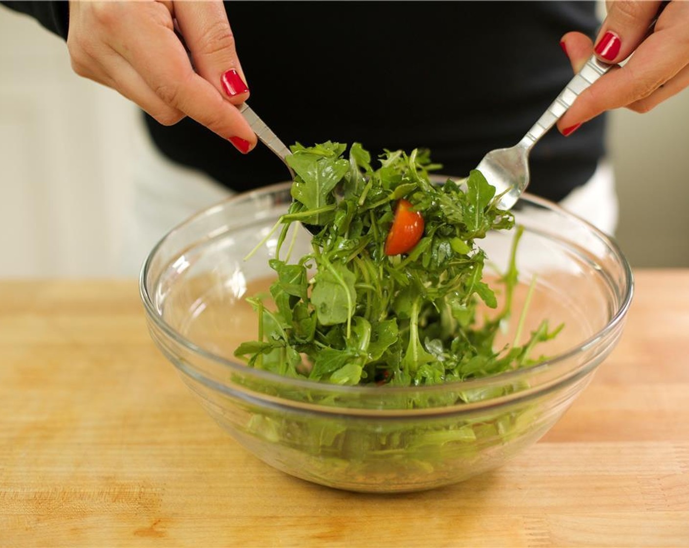 step 16 In a medium bowl, toss together the Arugula (5 2/3 cups), Cherry Tomato (1 cup) and dressing until well coated. Hold until plating.