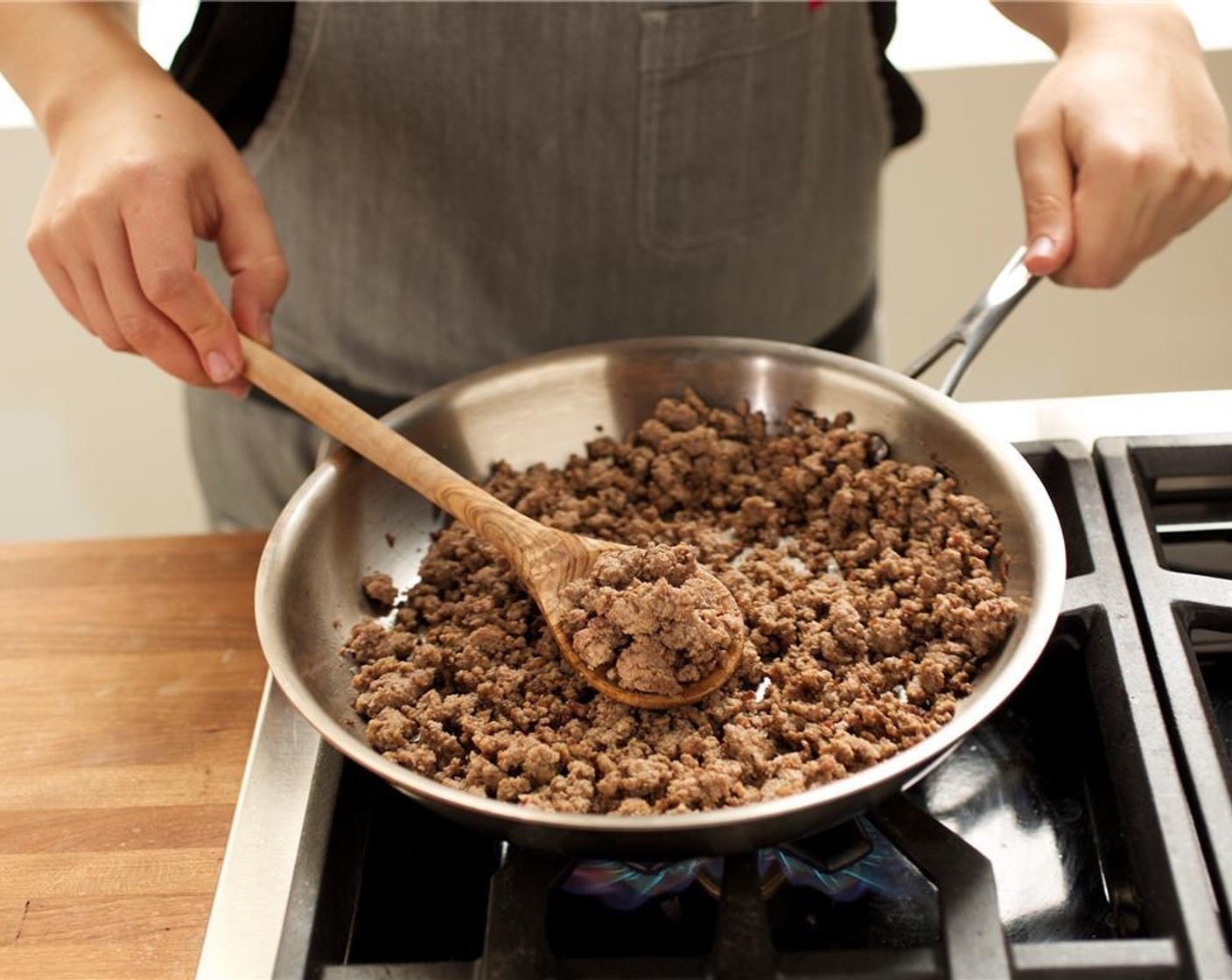 step 7 Add 85/15 Lean Ground Beef (8 oz), Salt (1/4 tsp), and Ground Black Pepper (1/4 tsp). Cook until browned, breaking up the beef into medium-sized pieces while cooking, about 6 minutes.