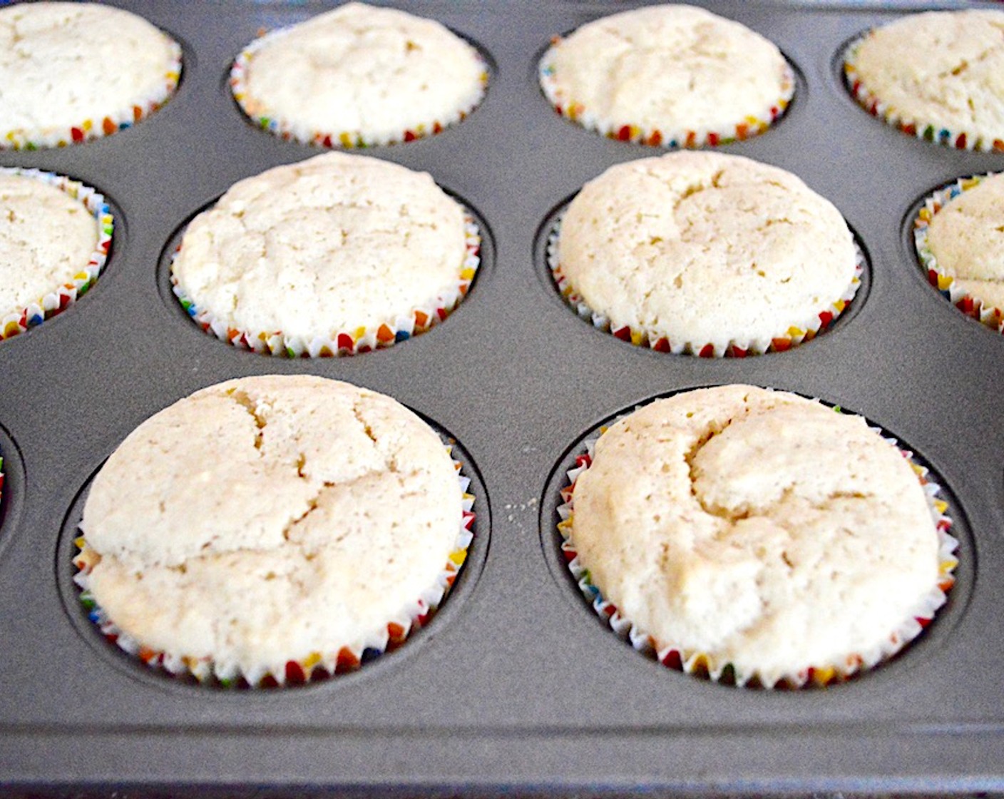 step 9 Evenly distribute the batter among the 16 wells, filling them just about 3/4 of the way. Bake the cupcakes for about 20 minutes, until golden and crackly around the edges. Let them cool completely.