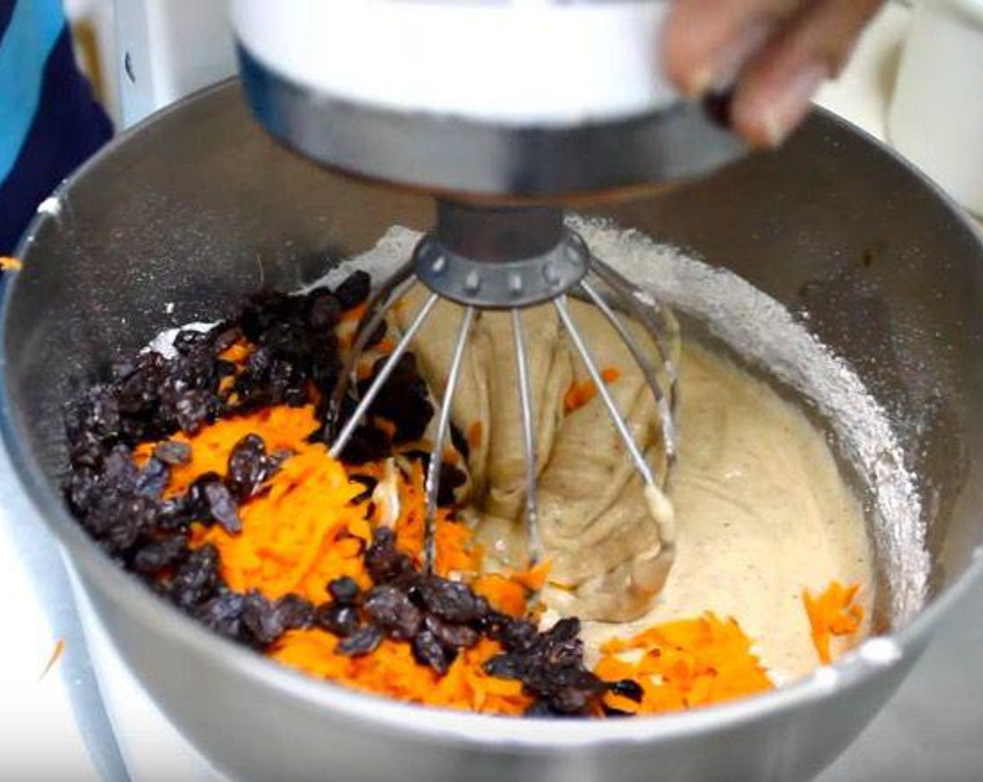 step 4 Add Carrots (3 cups) and Raisins (3/4 cup). Mix until just combined.