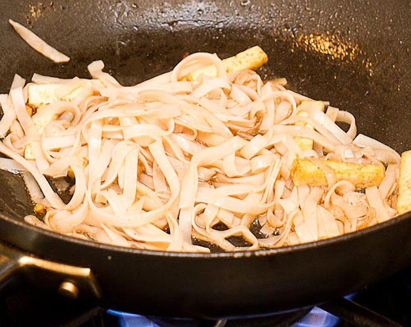 step 9 Stir in noodles, then add 3 tbsp of sauce mixture. Coat noodles and meat well and stir vigorously to keep noodles from sticking. After about 2 mins, taste noodles to check if they’re soft enough.