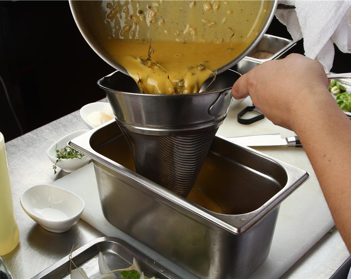 step 14 Place the turkey into a pan, and cover with the strained butter sauce.