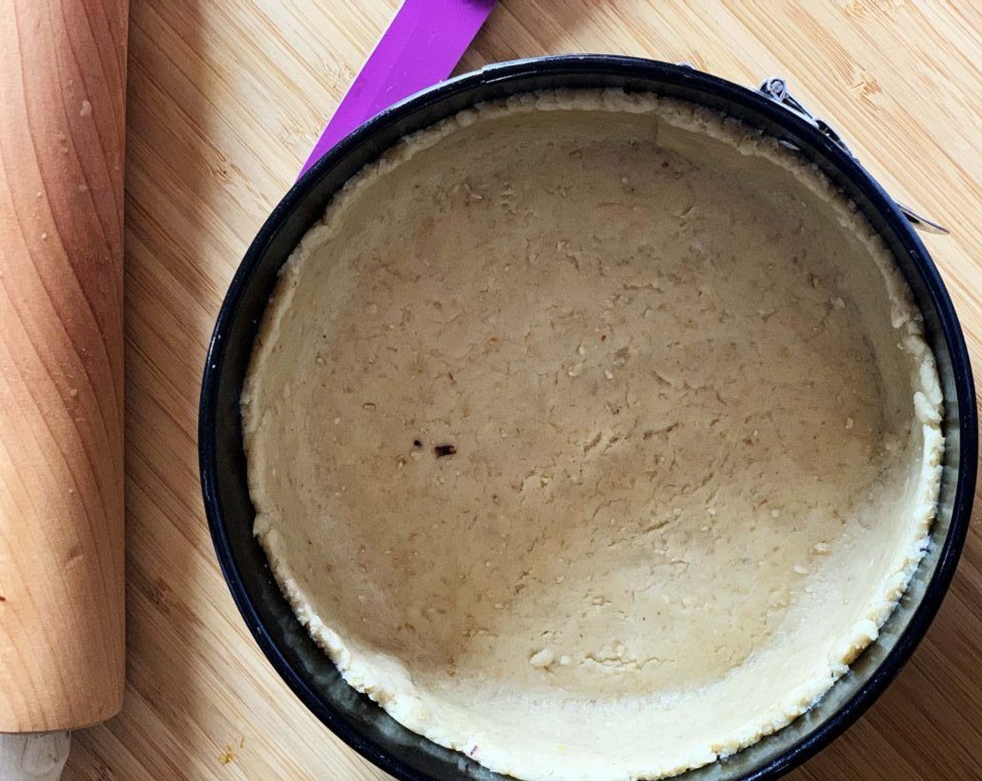 step 4 Roll out the dough and lay it in a baking pan. Set aside.