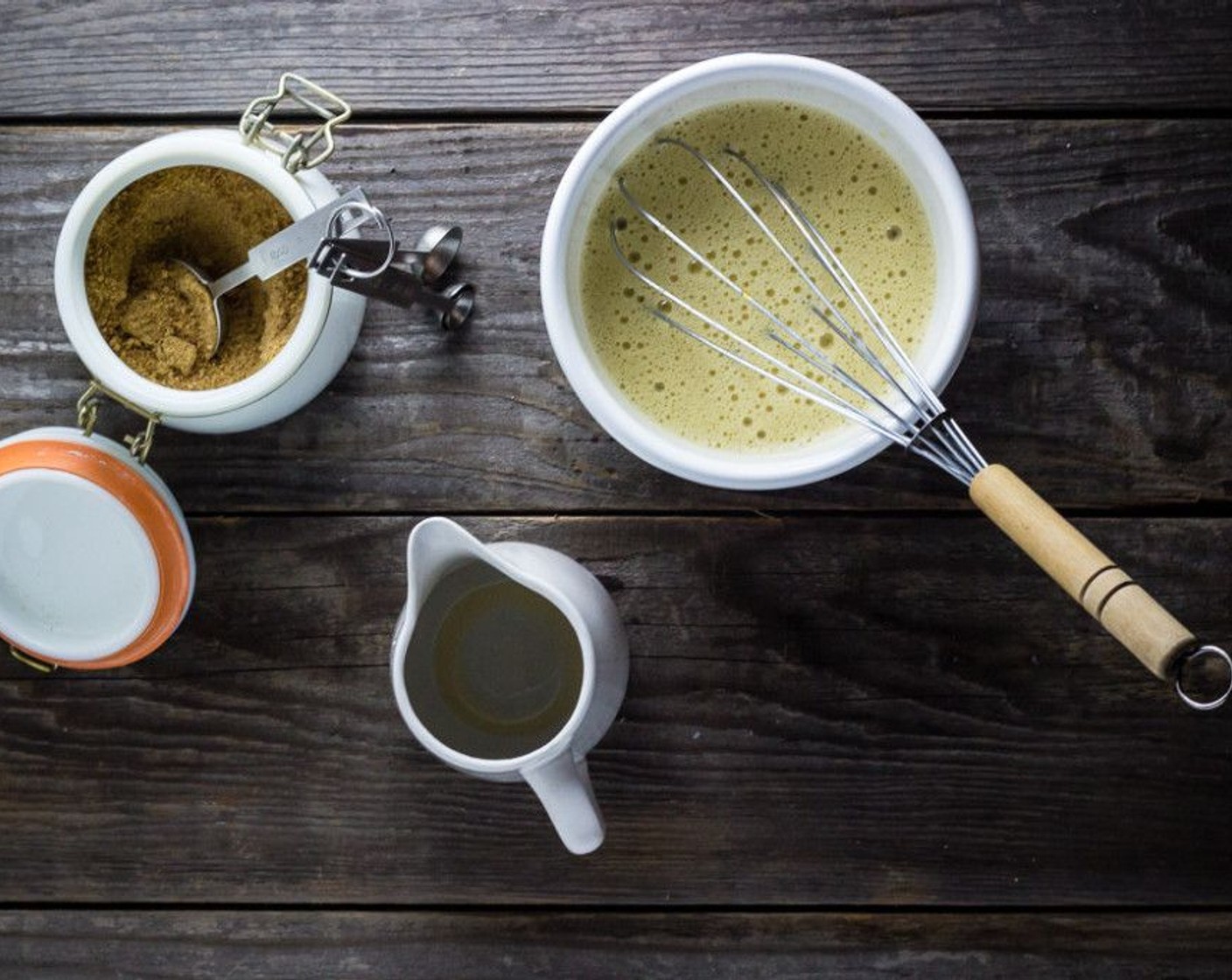 step 4 While cream mixture is heating, whisk the Eggs (6) and remaining Muscovado Sugar (1/4 cup) in a bowl until smooth, slowly whisk in 1 cup of warm cream mixture into yolk mixture to temper the yolks.