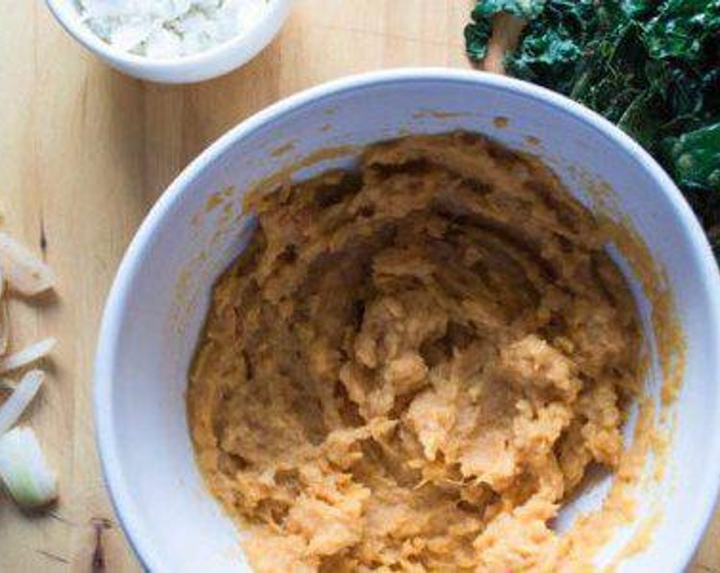 step 6 Remove skins from cooked sweet potatoes and mash flesh with a fork in a bowl.