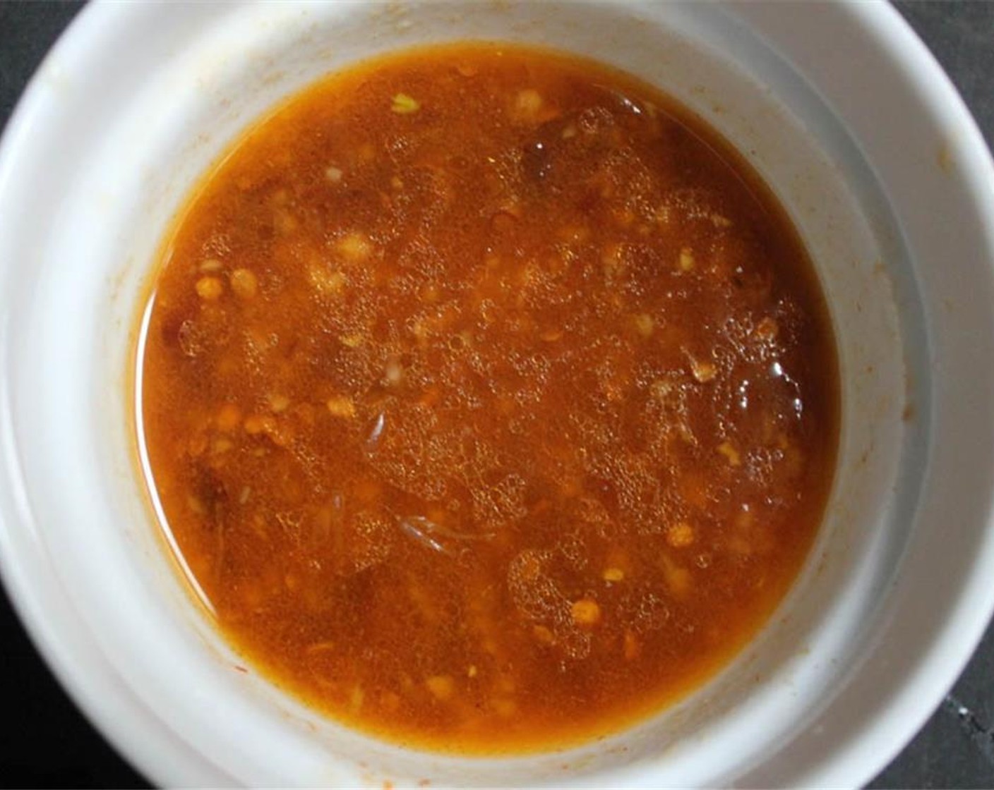 step 1 In a small bowl, mix the juice of Lime (1), Garlic (2 cloves), Chipotle Peppers in Adobo Sauce (1), Adobo Sauce (2 tsp), Honey (1 tsp), Ground Cumin (1 pinch), Extra-Virgin Olive Oil (1 Tbsp) and Salt (to taste). Set aside while you prepare the salad.
