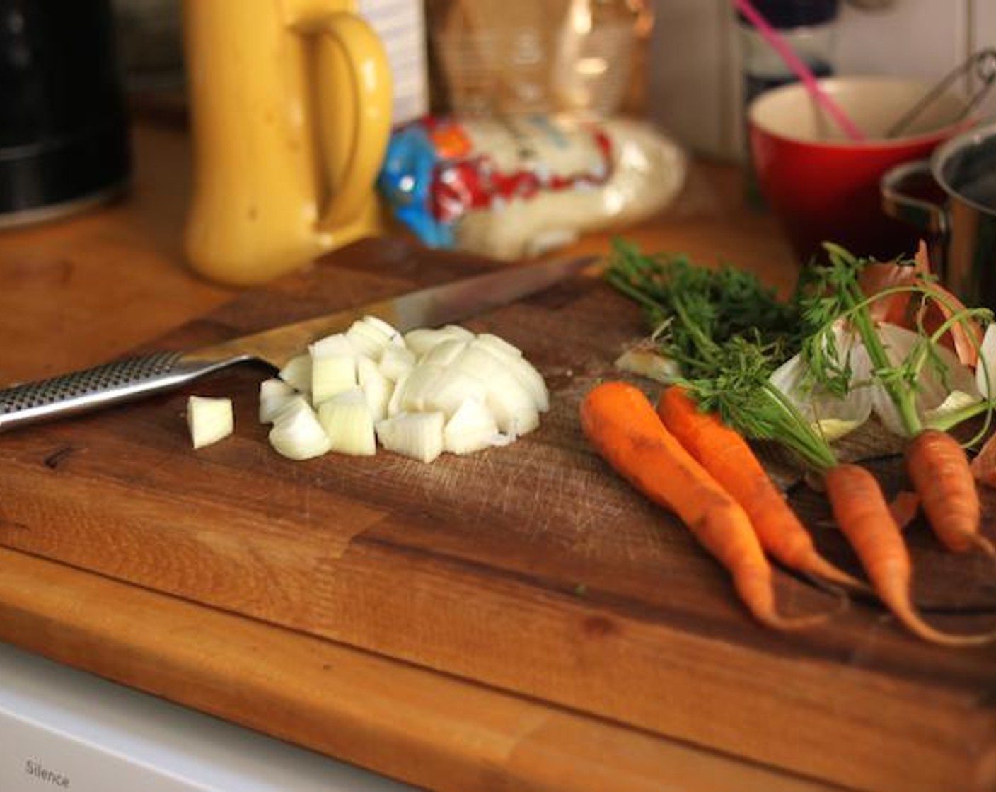 step 6 To make the Vegan Nikujaga, cut the Onion (1), Potatoes (2), and Carrot (1/2).