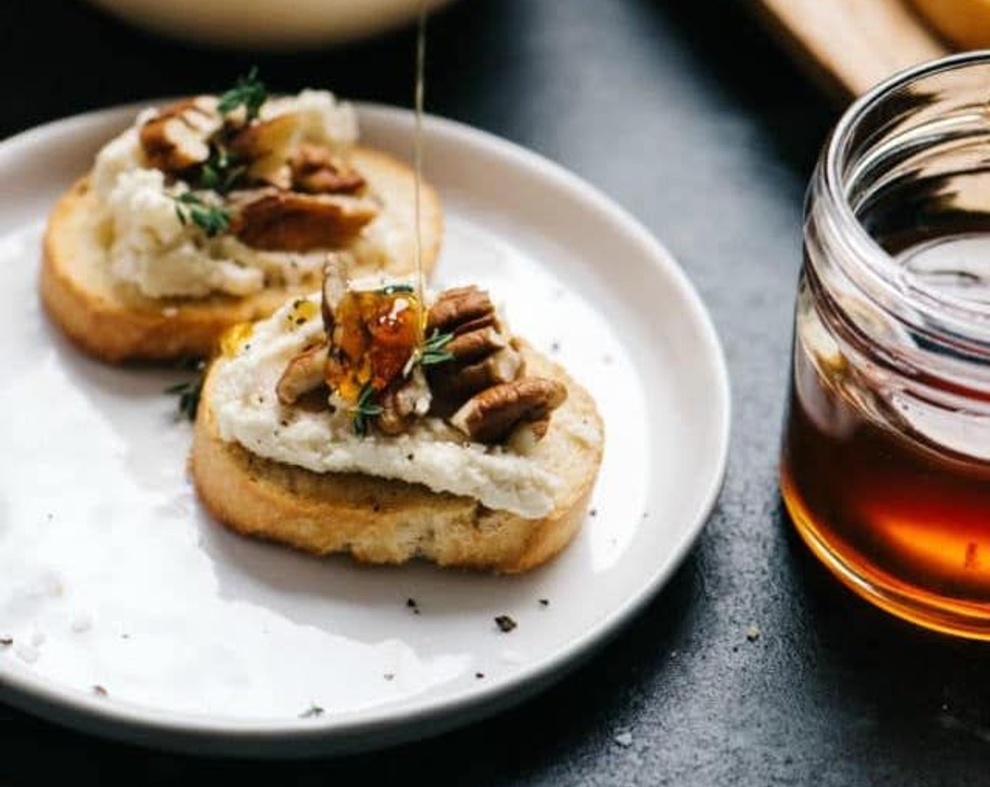 Goat Cheese Crostini with Honey, Pecans and Thyme