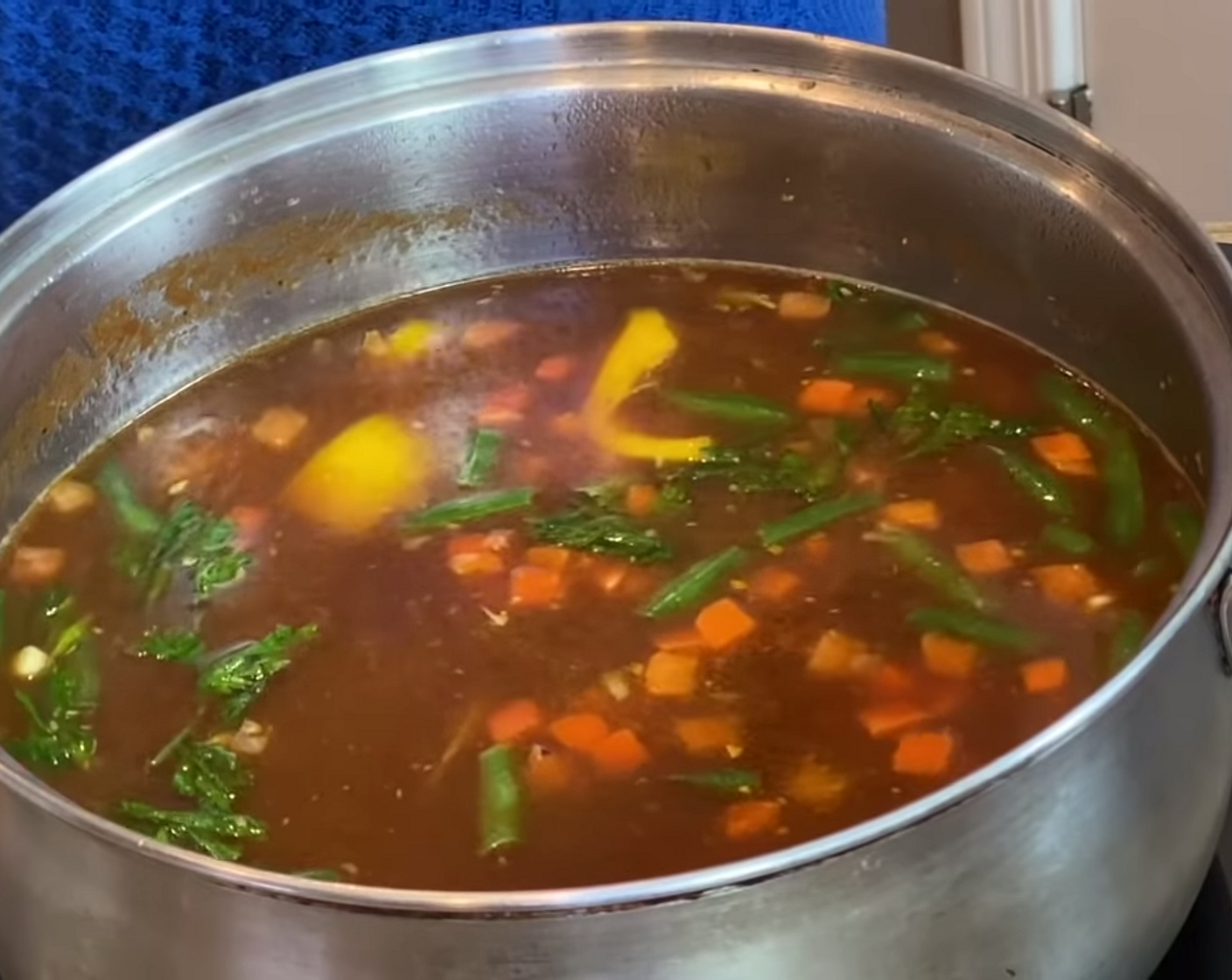 step 4 Add Water (4 1/2 cups), Fresh Cilantro (to taste), Frozen Mixed Vegetables (1 bag), and stir. Now cover and bring to a boil.