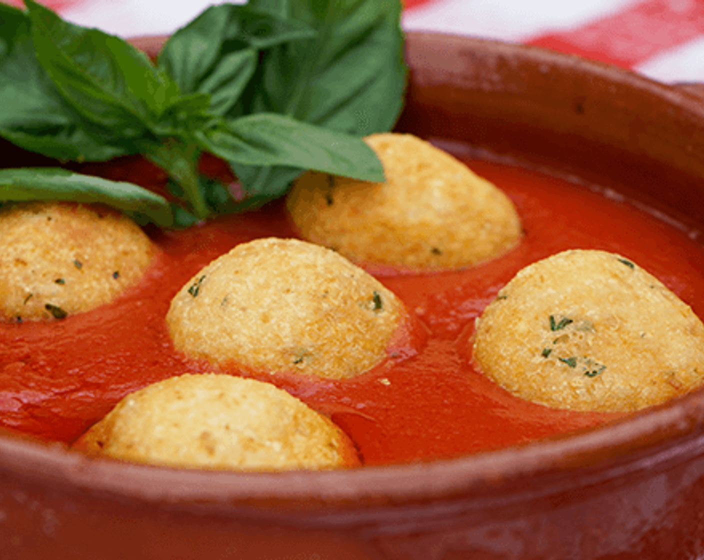 step 11 You can serve your Italian Cheese Balls immersed in the sauce, add a couple of Fresh Basil Leaves (to taste), and enjoy them while nice and hot. It is also a good idea to serve them on their own on a plate, accompanied by a side serve of tasty tomato sauce so guests can choose to have them on their own or using the tomato sugo as a dipping sauce.