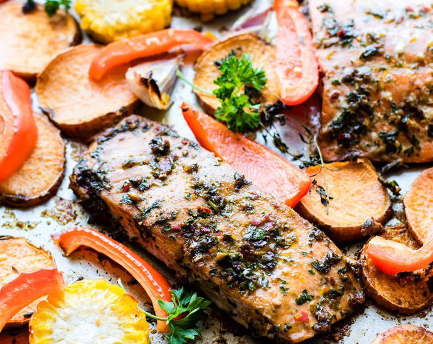 step 9 Sprinkle with Salt (1/4 tsp), Ground Black Pepper (1/4 tsp), and McCormick® Garlic Powder (1/4 tsp) over the whole sheet pan and salmon/veggie combo. Feel free to drizzle any leftover jerk marinade on top too.