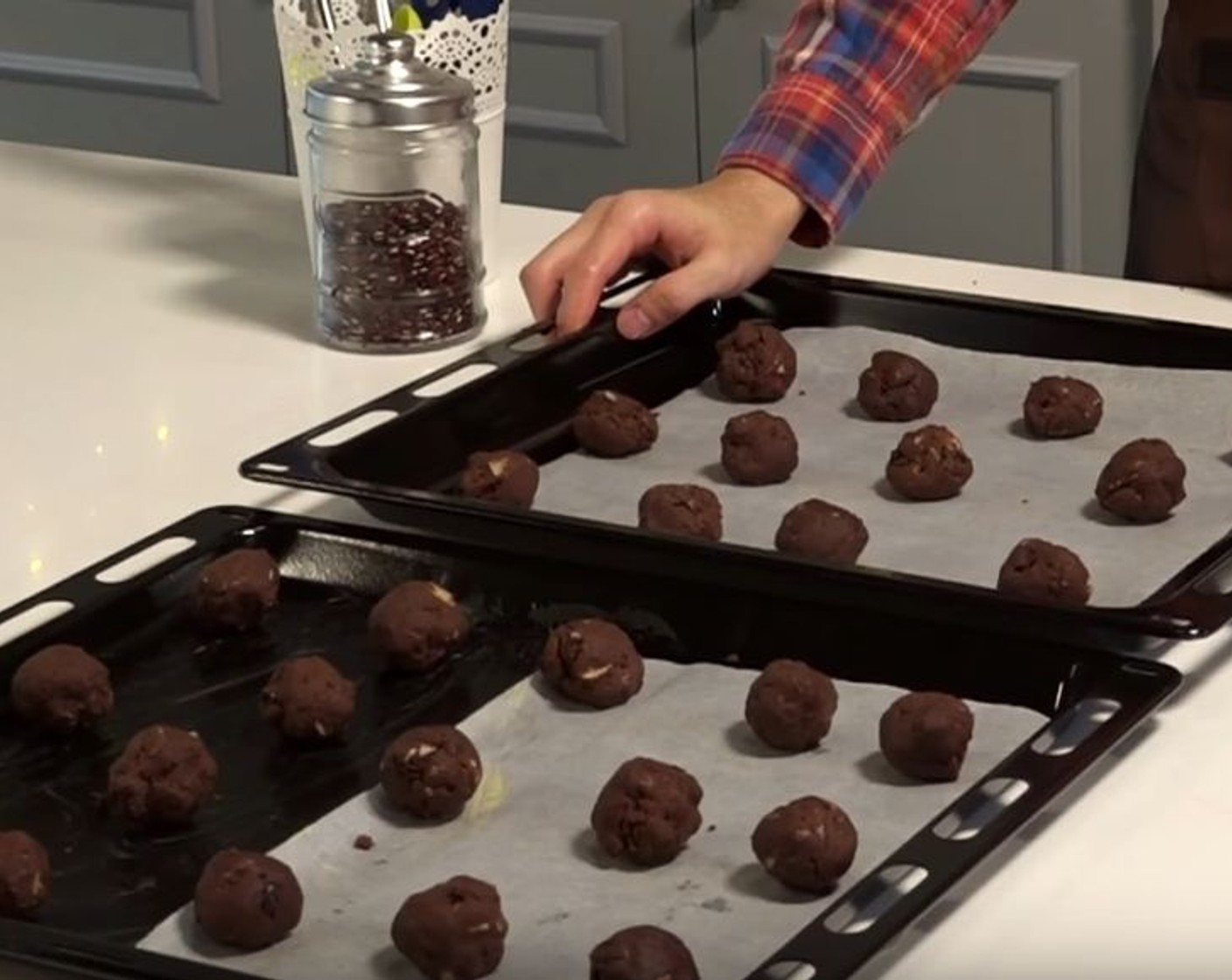 step 8 Scoop out the chilled dough with a tablespoon and roll it into a ball. Arrange on a lined baking sheet, and press down for a flatter cookie or leave as is if you like it chunky. Bake it in the oven for about 10 to 15 minutes.