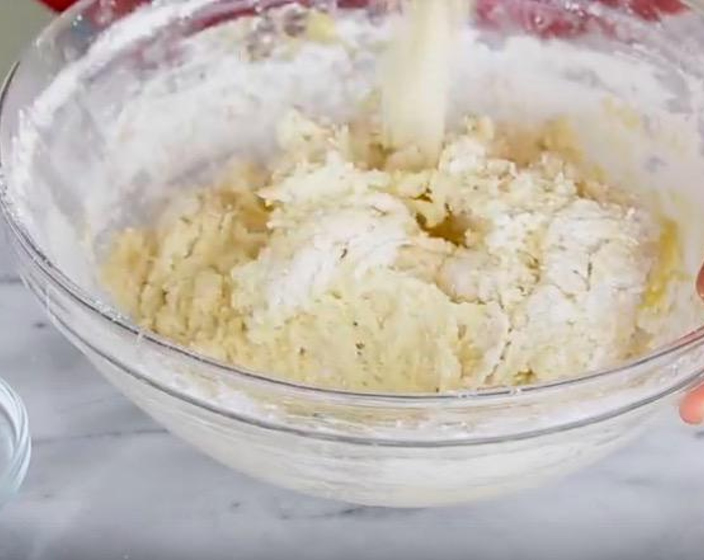 step 4 Using your hands, mix until the dough comes together.