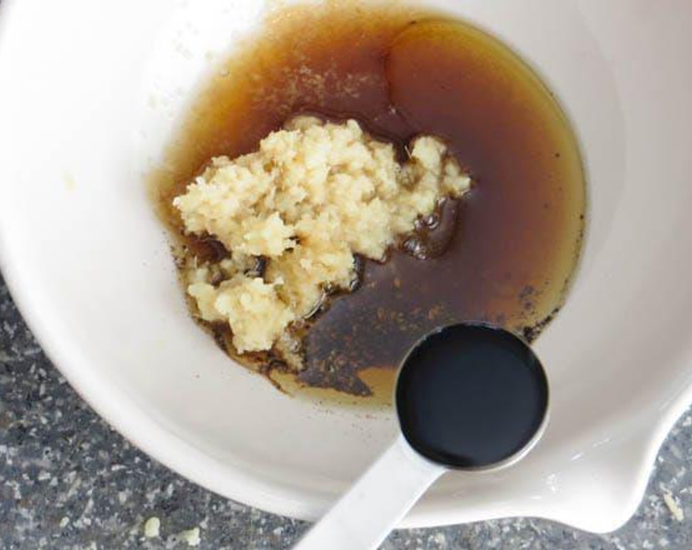 step 1 To make the vinaigrette, combine zest and juice from the Limes (2 1/4), Brown Sugar (1 1/2 Tbsp), Fish Sauce (1/2 Tbsp), Sesame Oil (1/2 Tbsp), Fresh Ginger (1/2 Tbsp), Soy Sauce (1/2 tsp), and Freshly Ground Black Pepper (1/4 tsp) in a small bowl. Whisk. Cover and refrigerate.