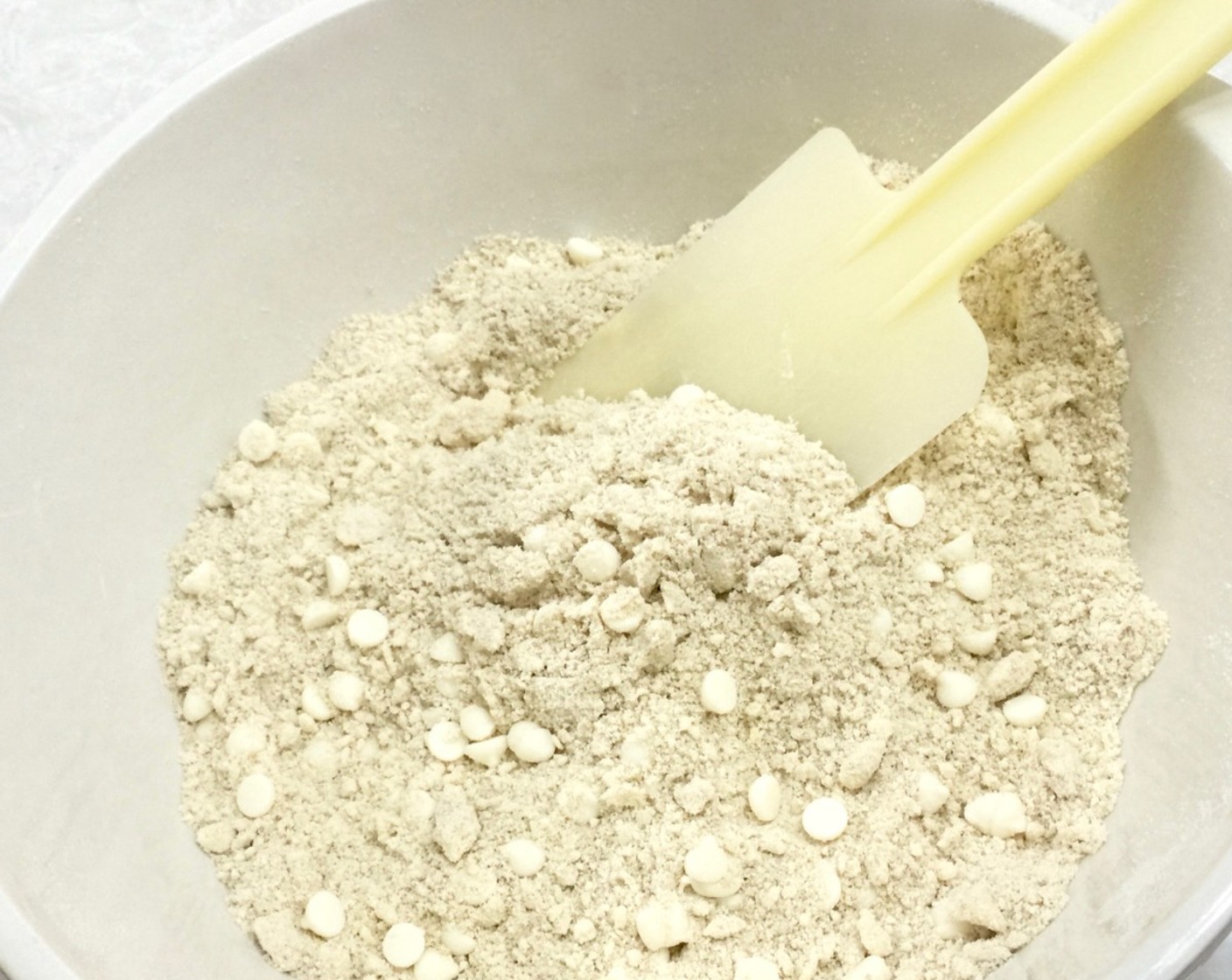 step 11 Mix the white chocolate into the coarse Breadcrumbs (1 cup) and set aside while we prepare the wet ingredients.