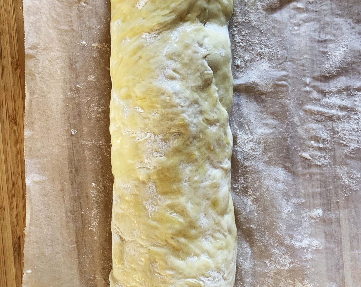 step 11 Gently roll it up sealing well the edges together. Brush the top with Extra-Virgin Olive Oil (2 Tbsp).