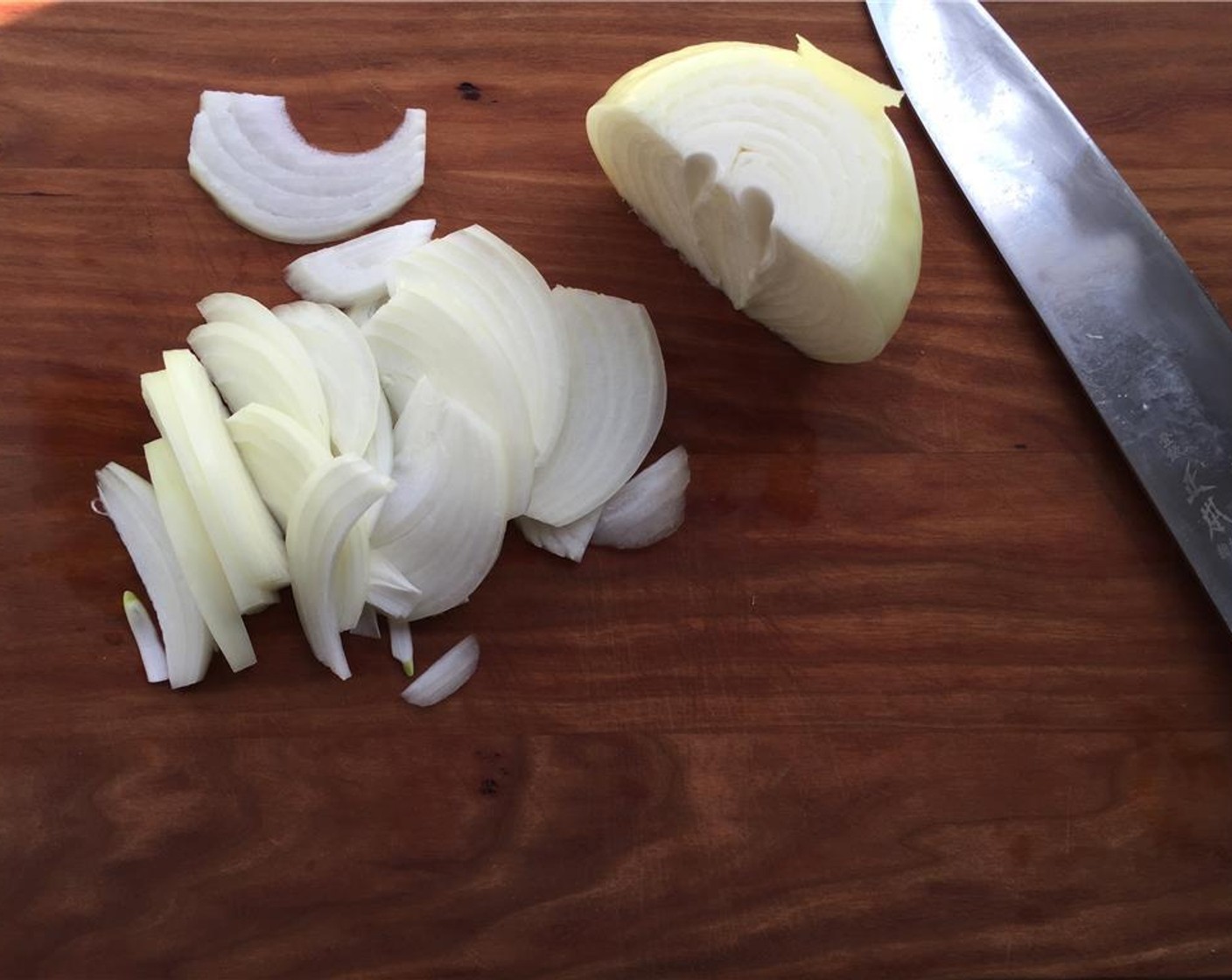 step 3 Thinly slice the Spanish Onion (1/2).