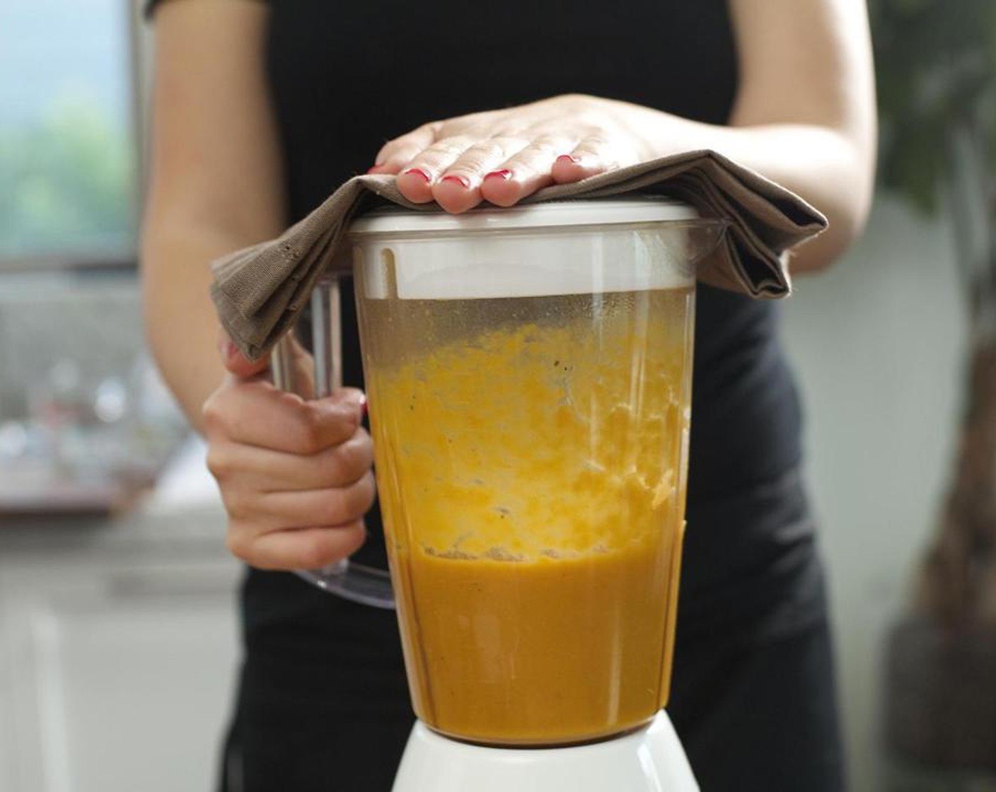 step 5 Remove the pot from the stove and pour the mixture in small batches into a blender. Blend on high speed until smooth. When each batch is finished blending, pour soup into a large bowl.