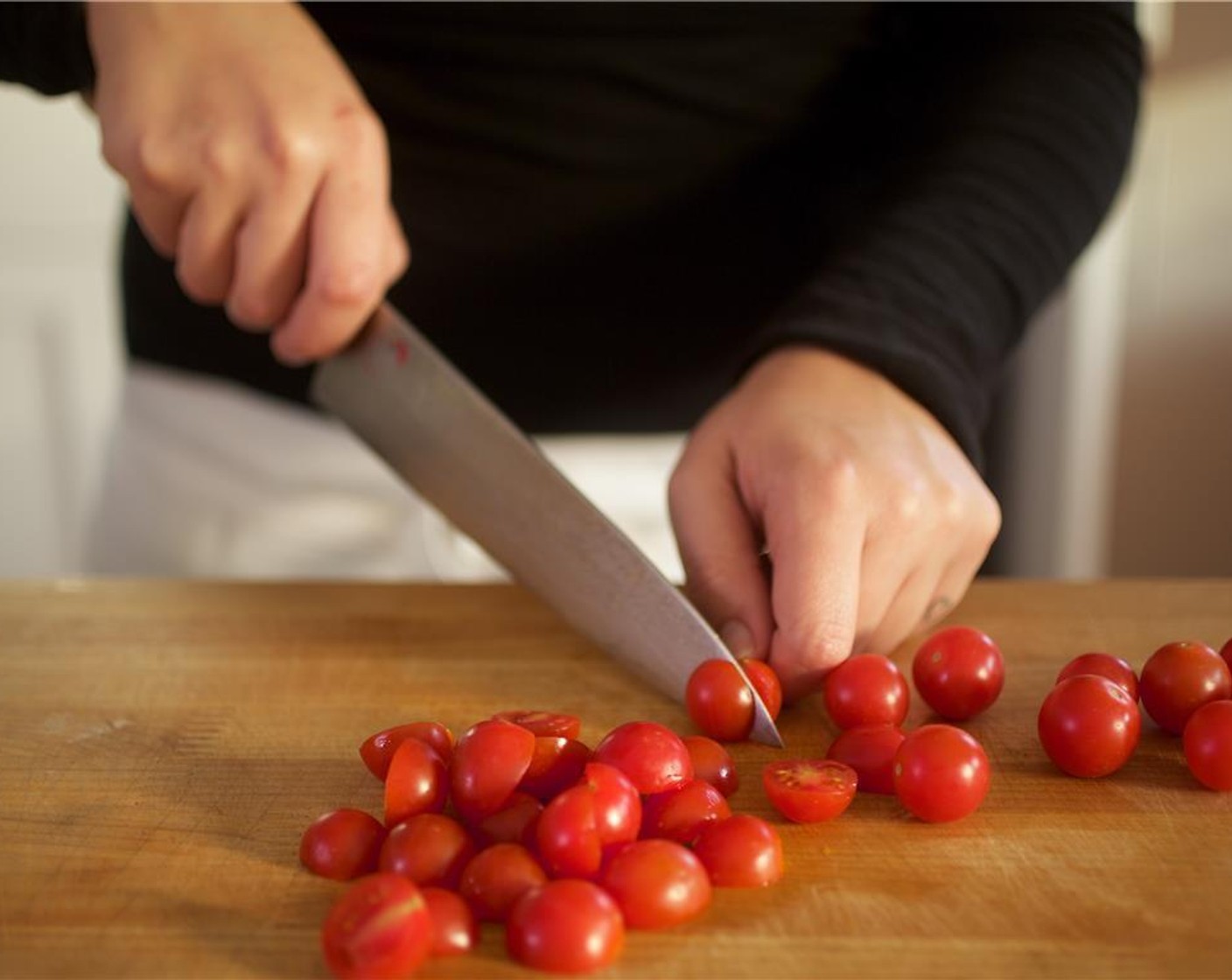 step 1 Bring eight cups of water to a boil in a large saucepan over high heat. Remove the Fresh Basil (1/2 cup) leaves from their stems. Stack the basil leaves into a neat pile and slice very thinly across, and set aside.