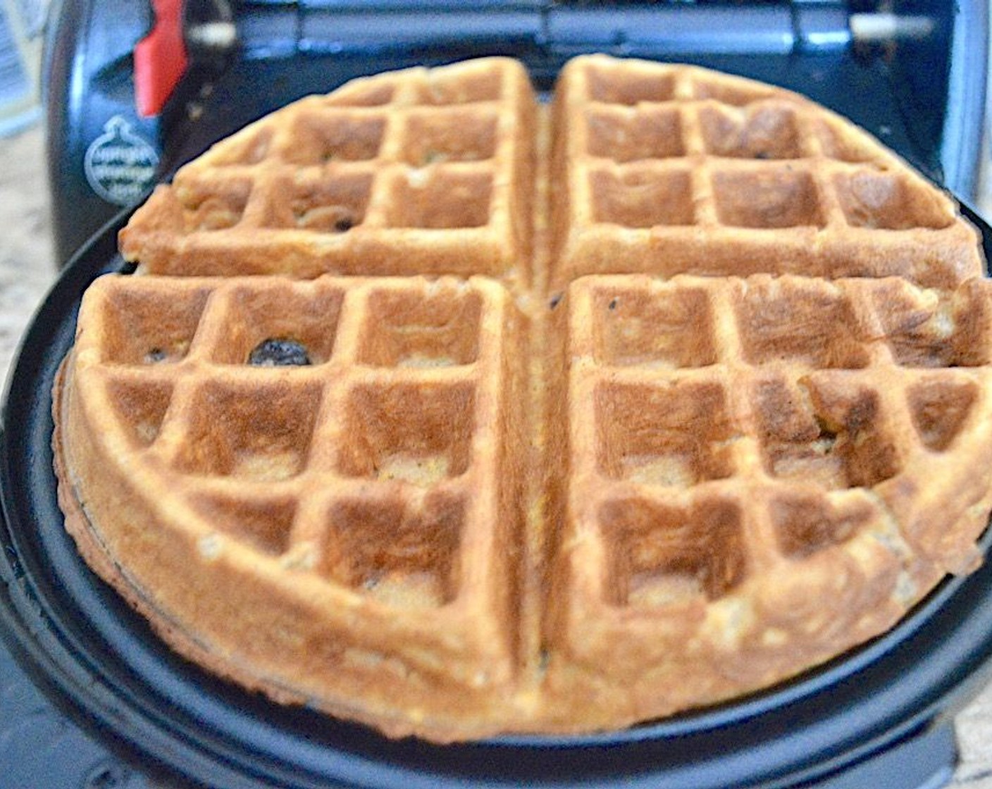 step 5 Scoop 1/4 of the batter into the waffle maker and spread it out evenly to thinly cover the whole bottom half. Close it and cook the batter for about 4-5 minutes.
