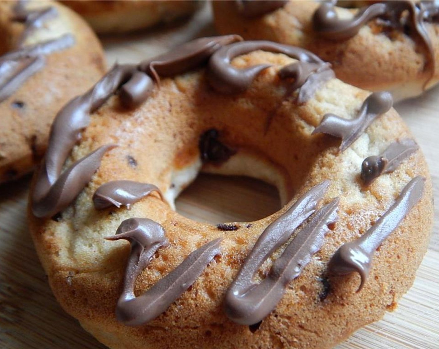 step 4 Let cool then spoon your Nutella® (1 1/2 Tbsp) into a zip lock bag and cut a small hole, pipe onto donuts, when ready to serve.