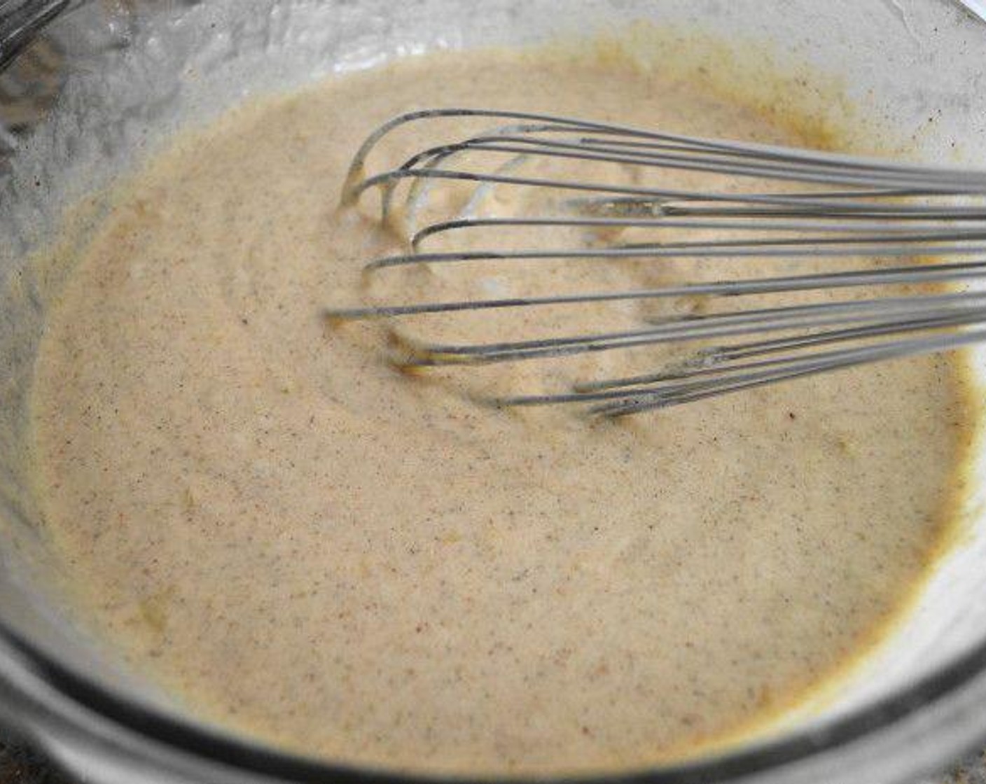 step 3 In another bowl, whisk the Butter (1 stick), Milk (1 cup), Canola Oil (1 Tbsp), Rose Water (1 tsp), and Eggland's Best Classic Eggs (2) together until smooth.