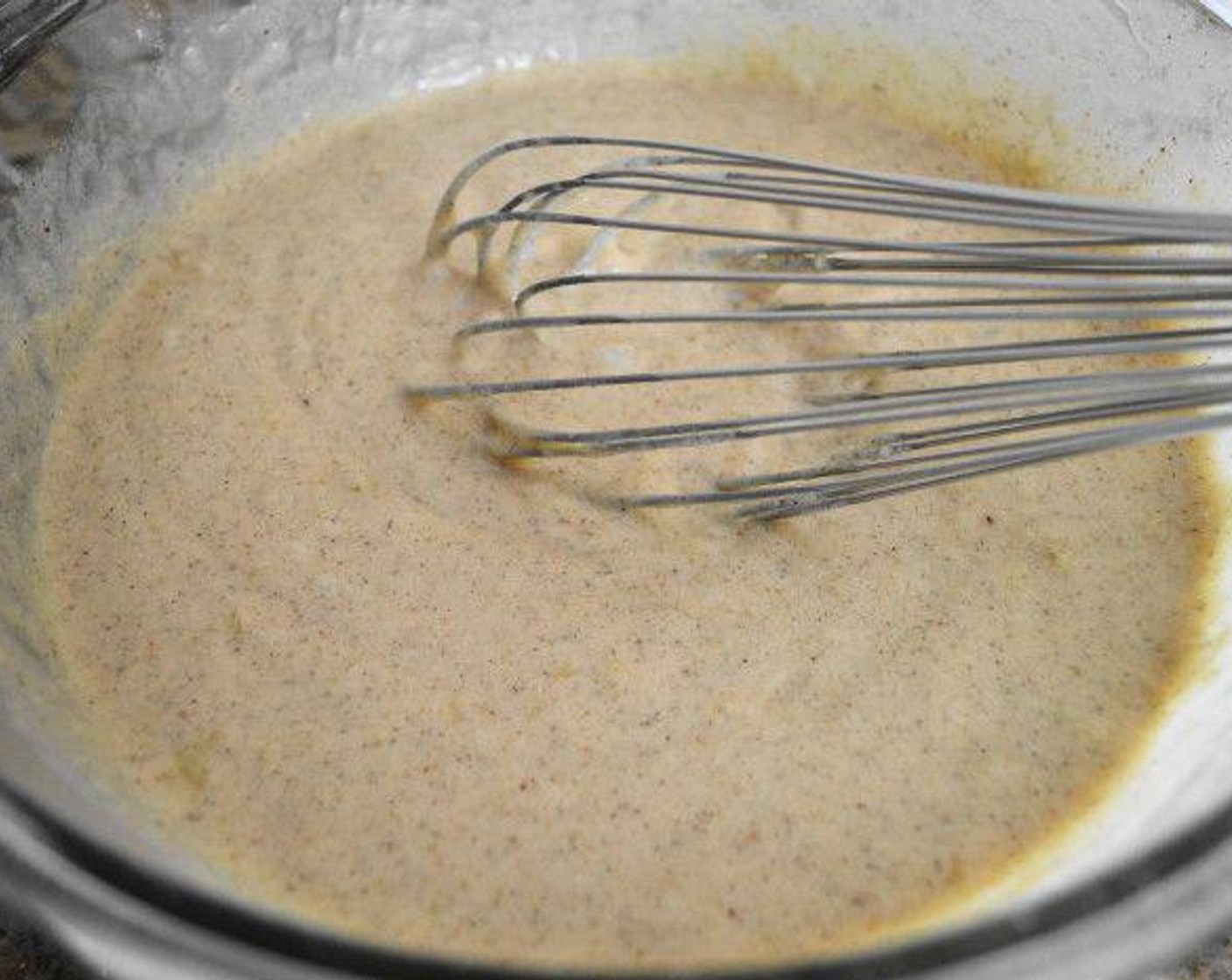 step 3 In another bowl, whisk the Butter (1 stick), Milk (1 cup), Canola Oil (1 Tbsp), Rose Water (1/2 Tbsp), and Eggs (2) together until smooth.